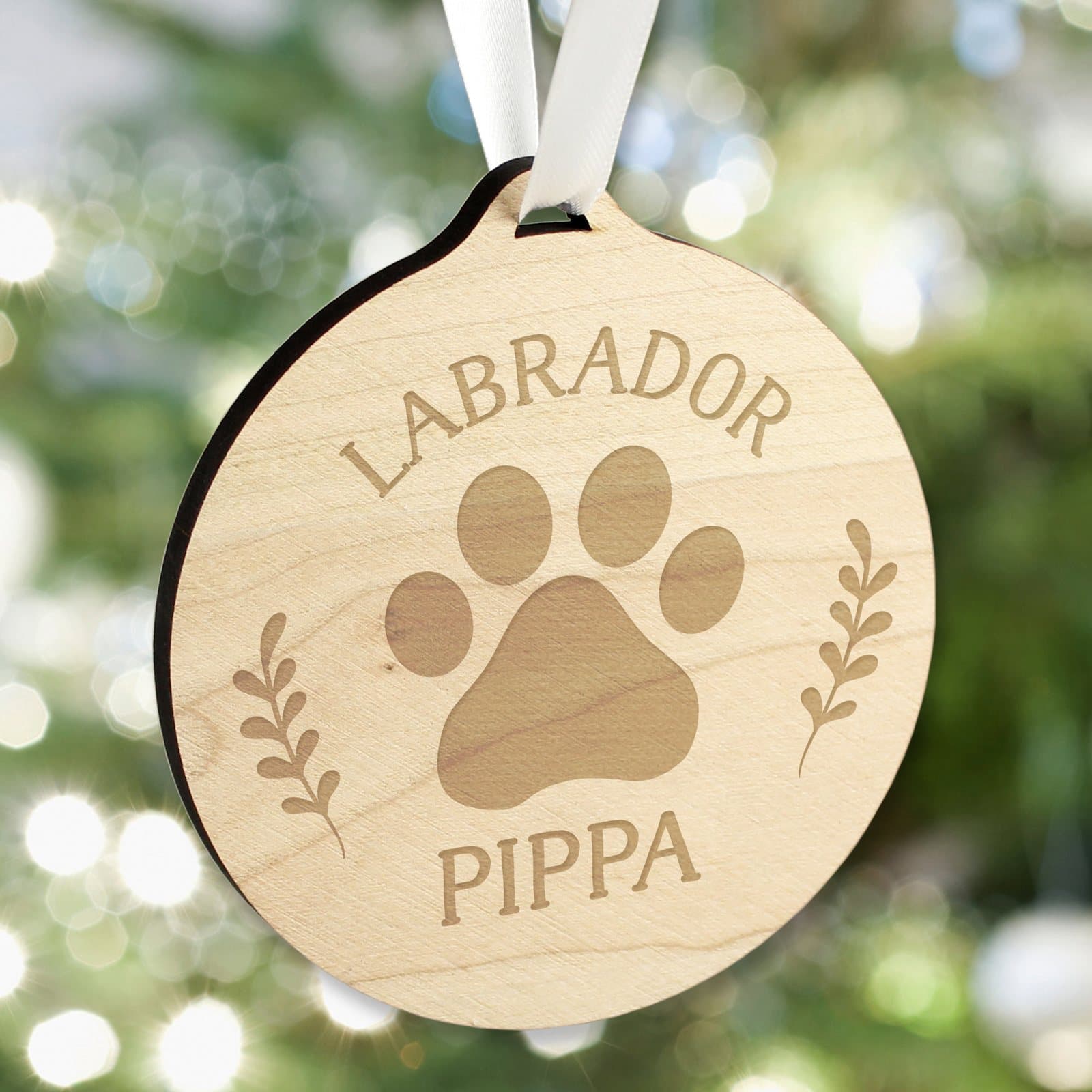 Round wooden dog breed bauble with ribbon and two lines of text