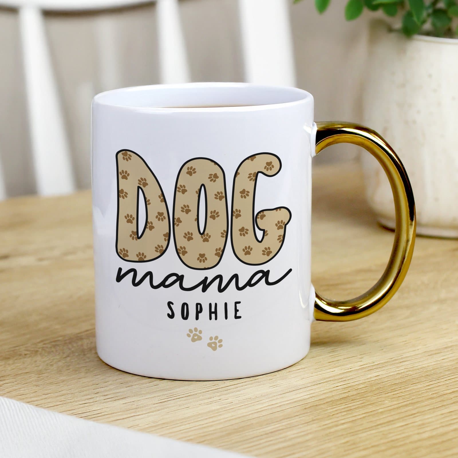 Ceramic dog mama mug with a gold handle and personalised text