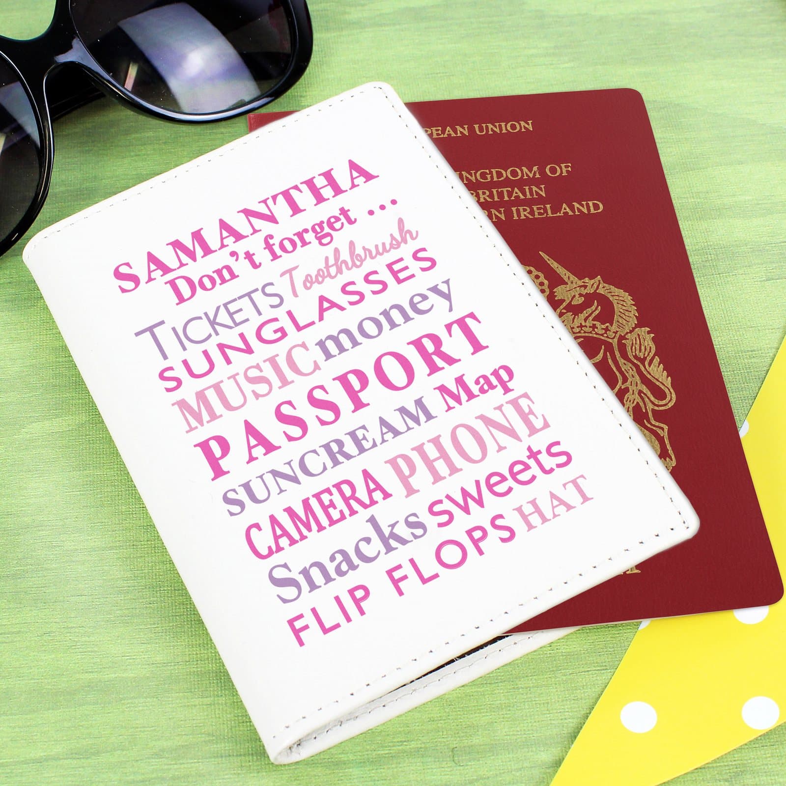 Leather passport holder with Don't Forget wording and a name