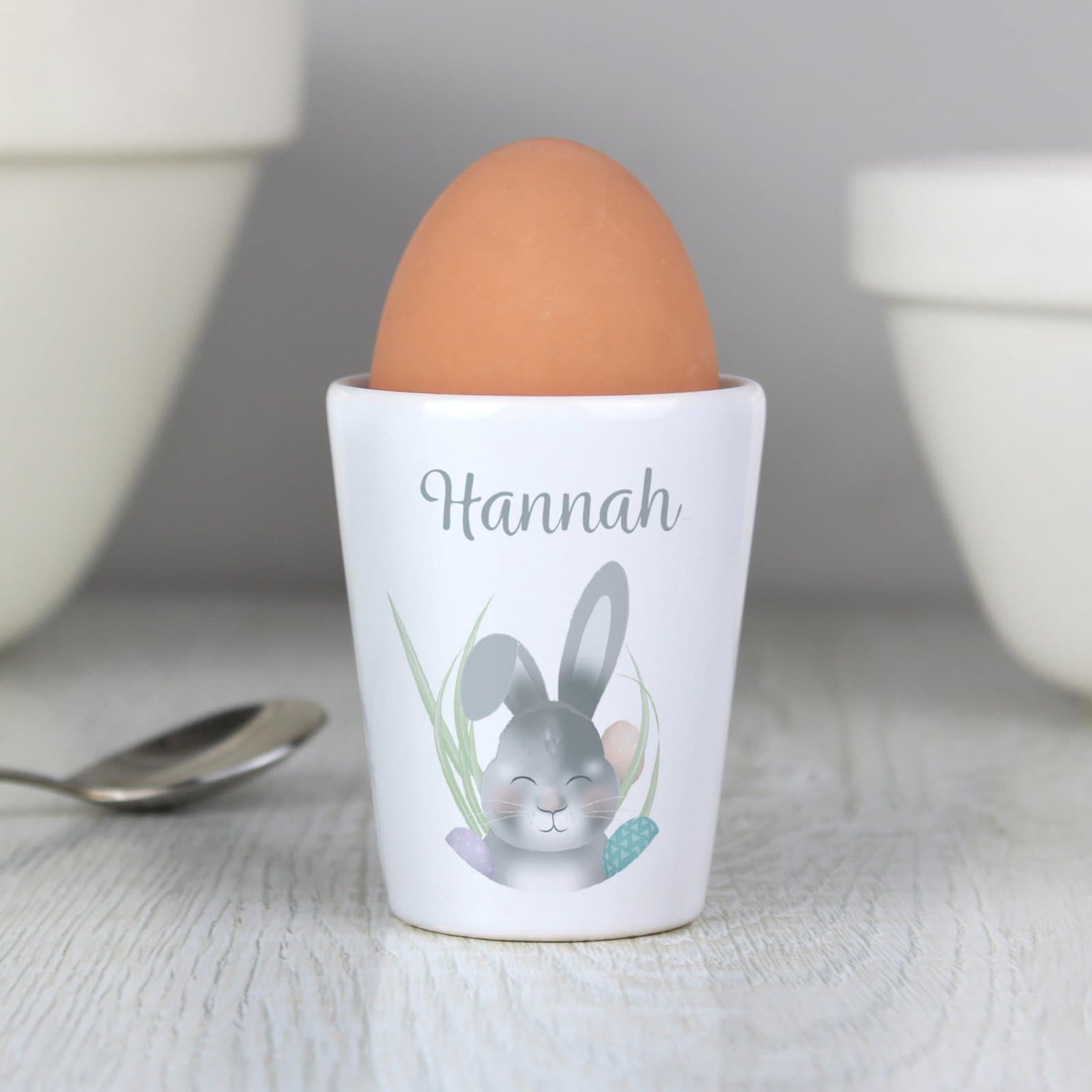 Ceramic Easter bunny egg cup personalised with a name