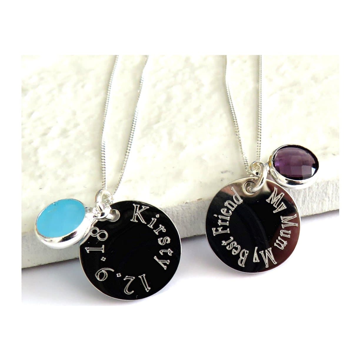 Sterling silver necklace with a round engraved disc and a coloured birthstone charm