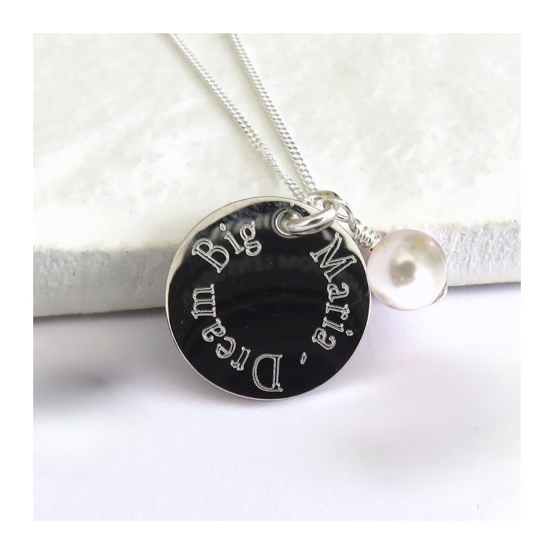 Personalised edge necklace with a round silver charm and a pale ivory glass pearl