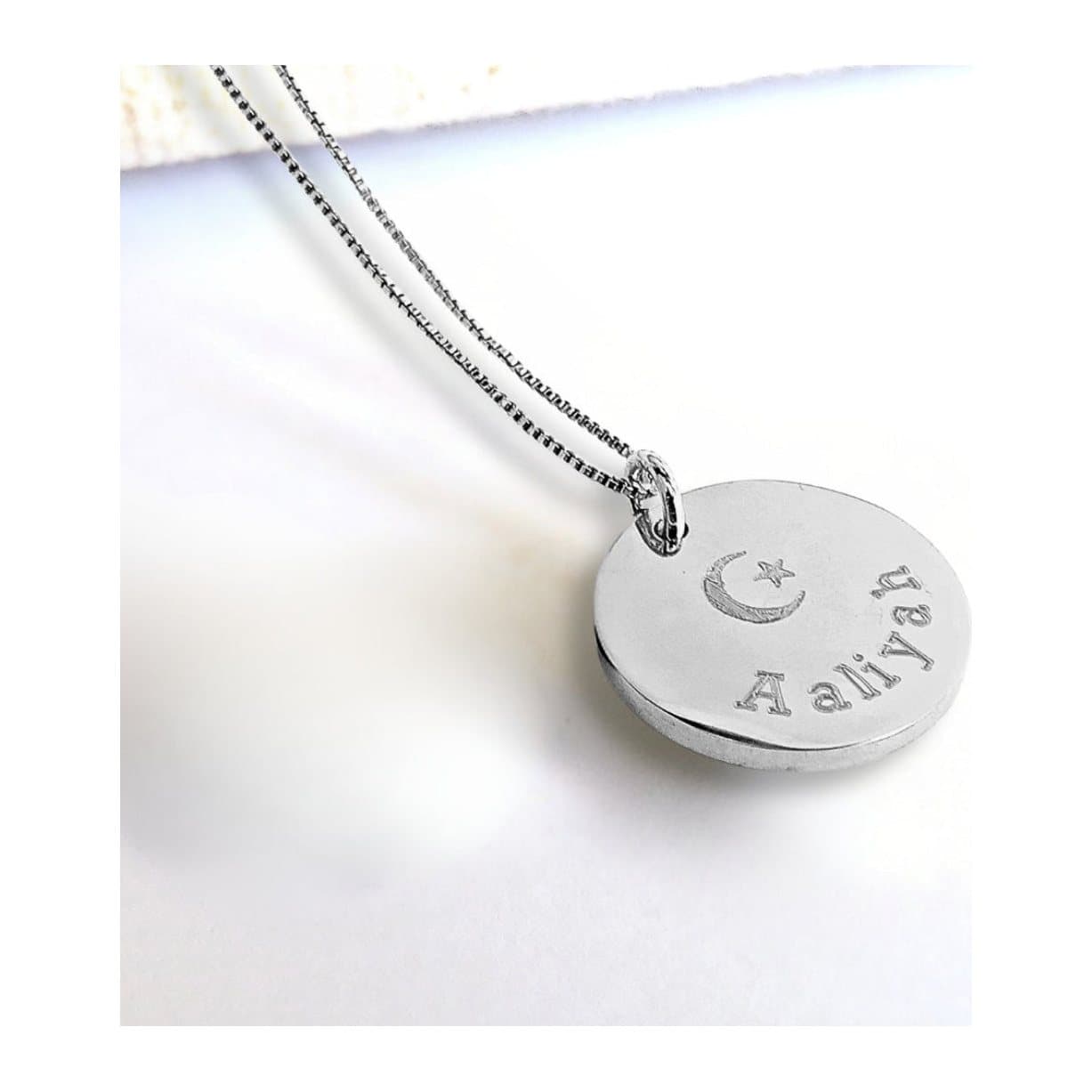 Silver Eid necklace with a disc engraved with a name and a crescent moon and star