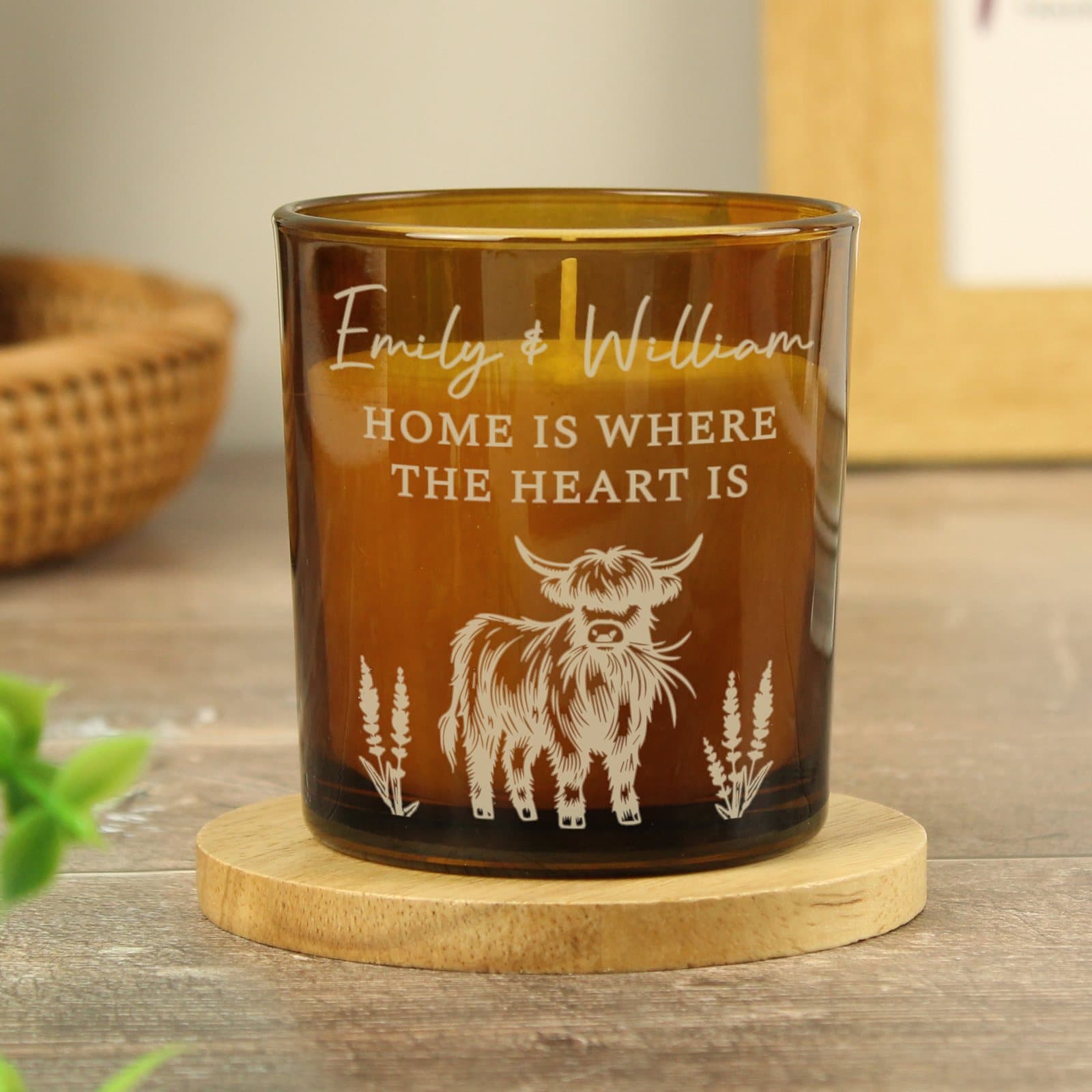 Amber glass highland cow candle jar with a personalised three line message
