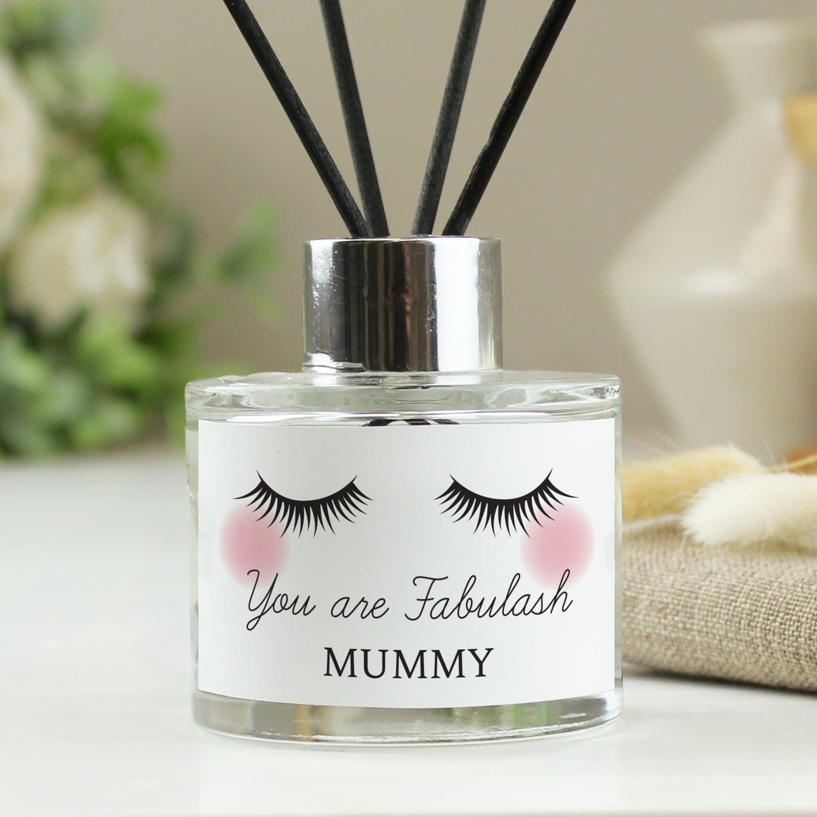 Personalised eyelashes glass reed diffuser with two lines of text
