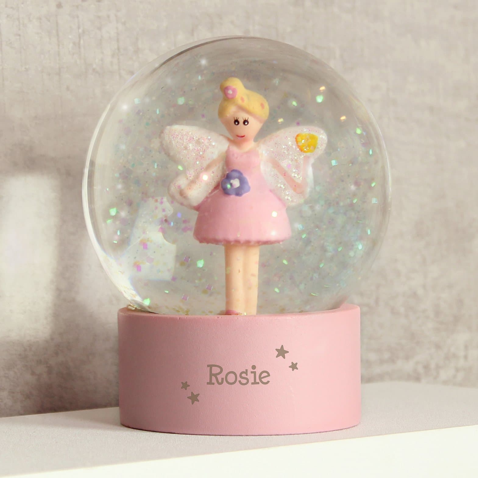 Fairy glitter snow globe in resin and plastic