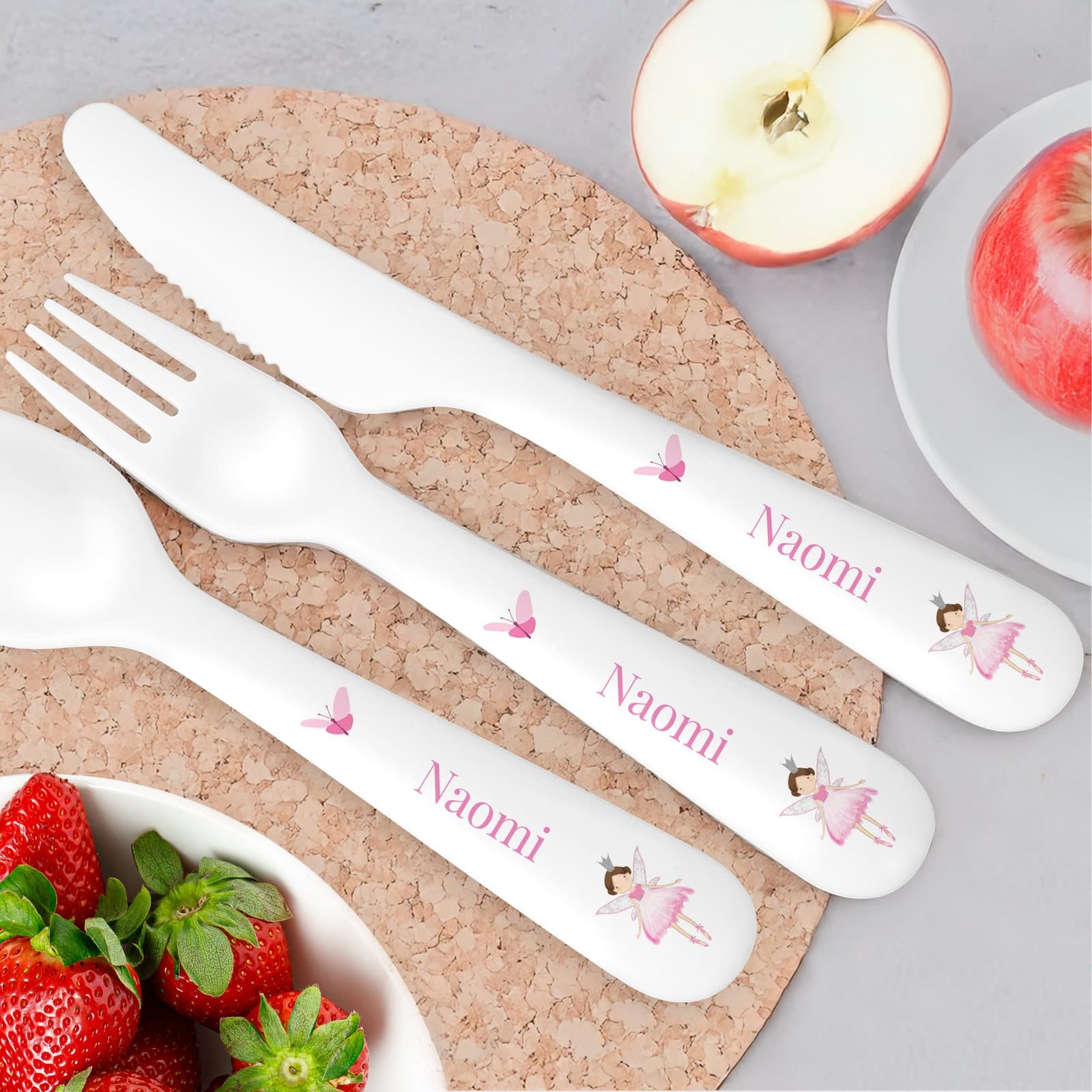 Three-piece plastic cutlery set with a toadstool fairy design and a name