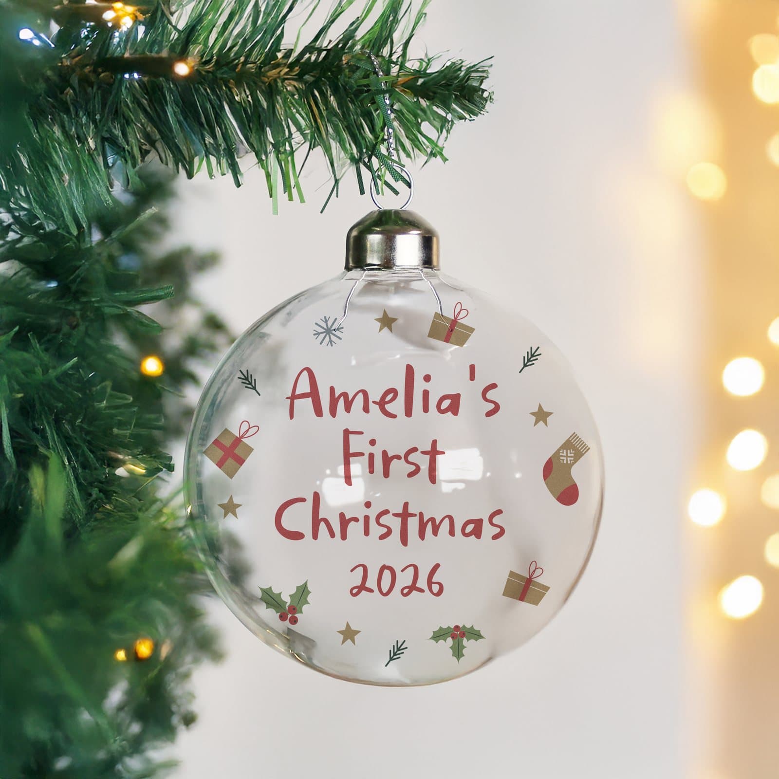 Personalised first Christmas glass bauble with name and year