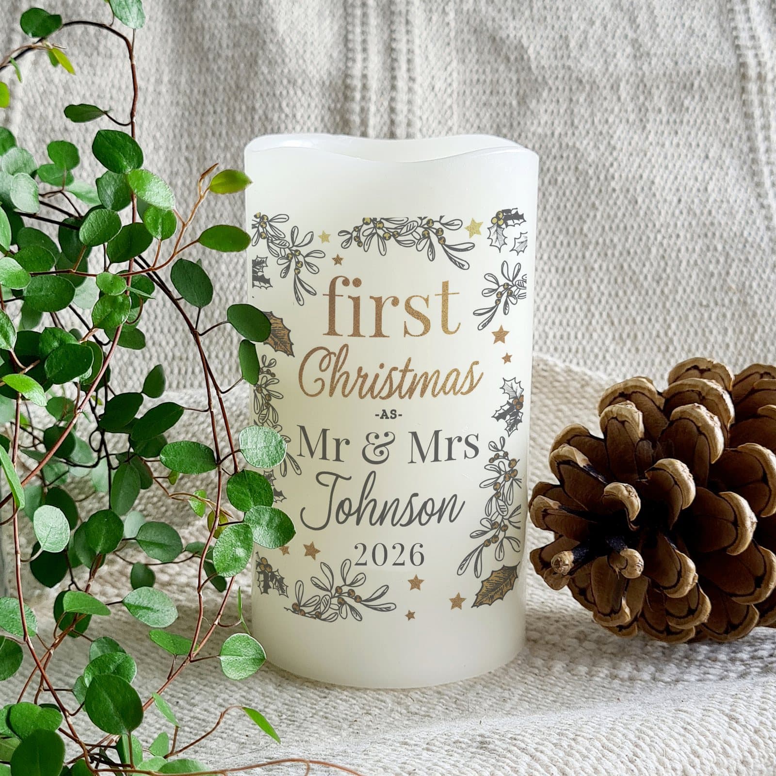 Personalised First Christmas LED pillar candle with a flame effect