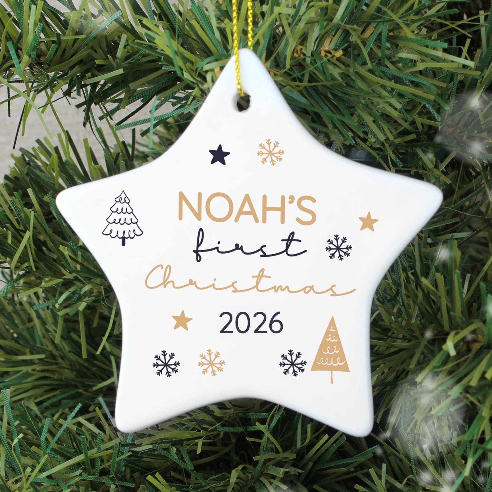 First Christmas star tree decoration with a ribbon