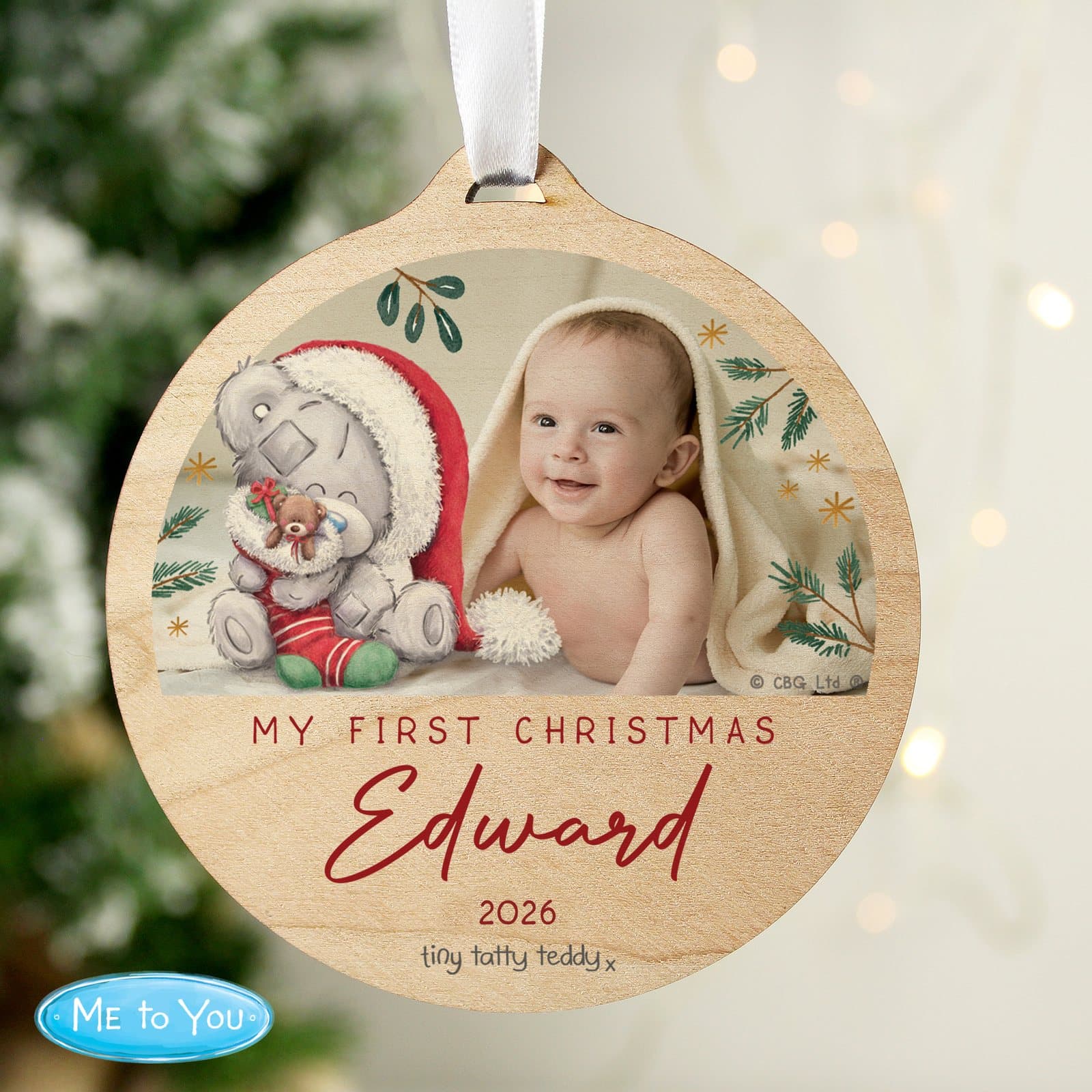Round wooden first Christmas Tiny Tatty Teddy decoration with ribbon