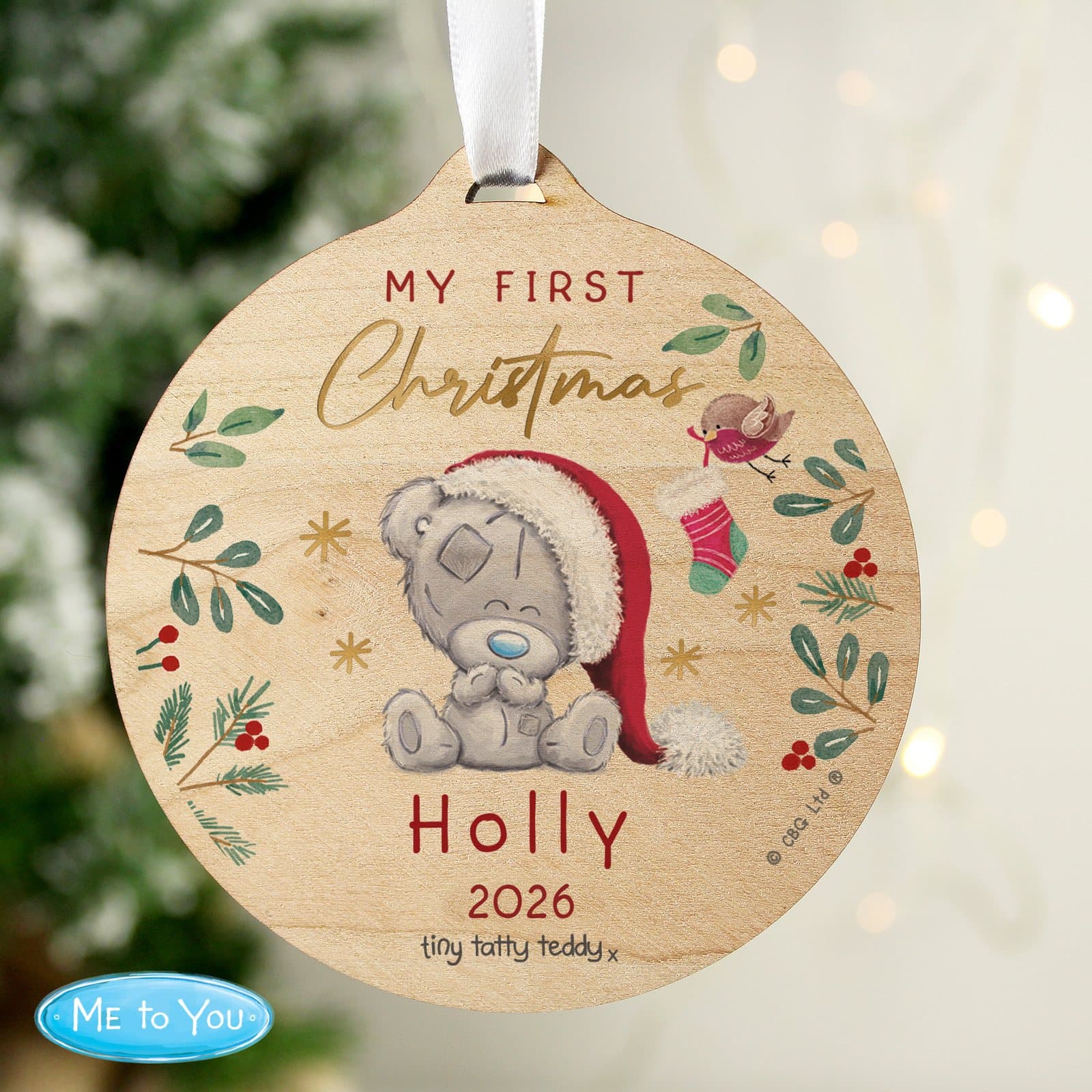 Round wooden Tiny Tatty Teddy first Christmas decoration with ribbon