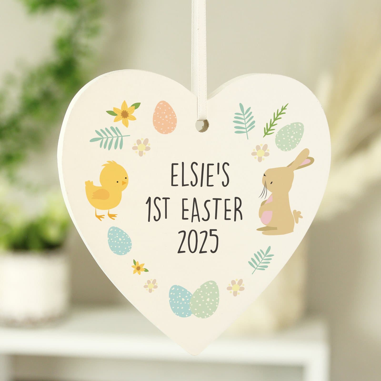 Wooden heart Easter tree decoration with a name above the text 1st Easter 2025