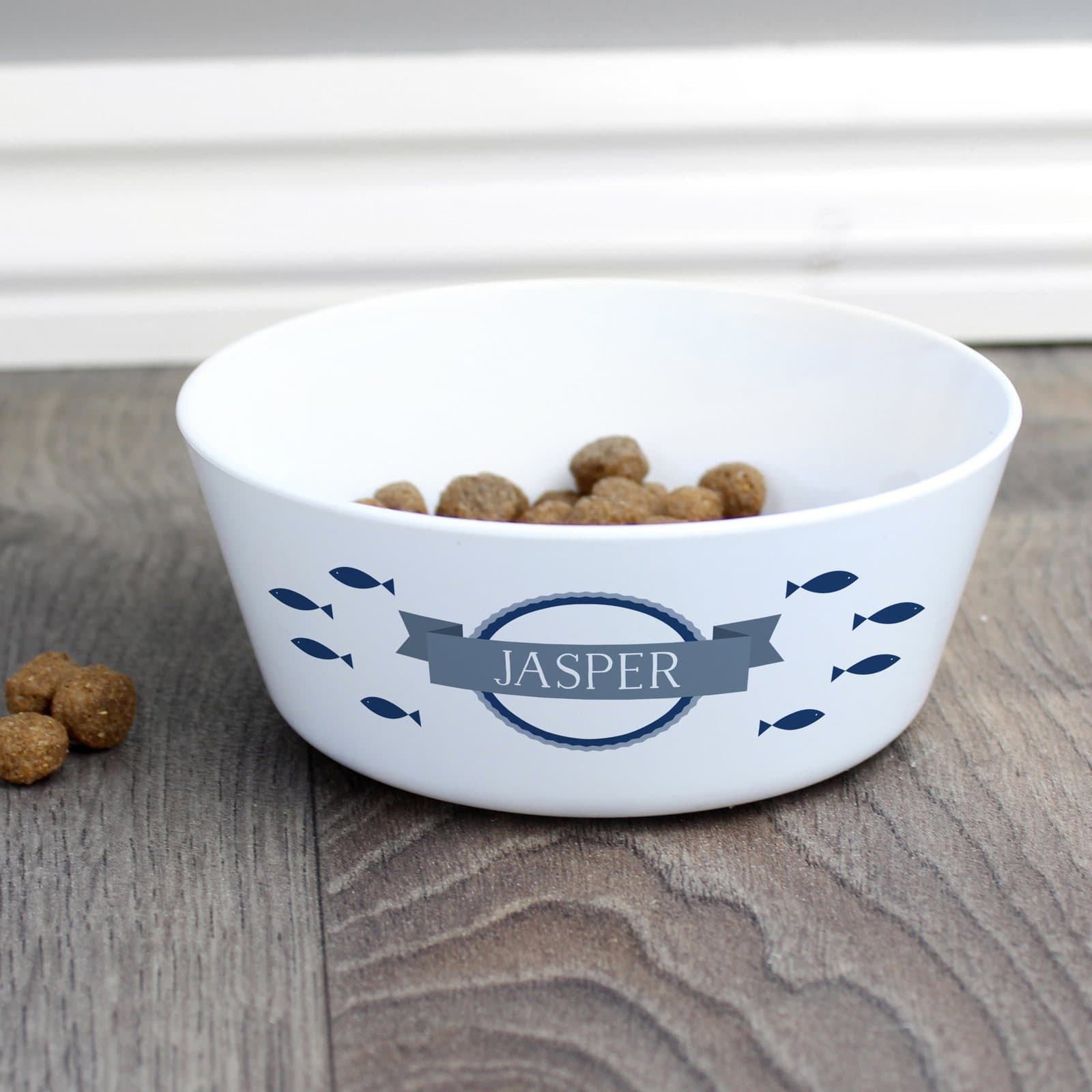 Plastic cat bowl with a fish design