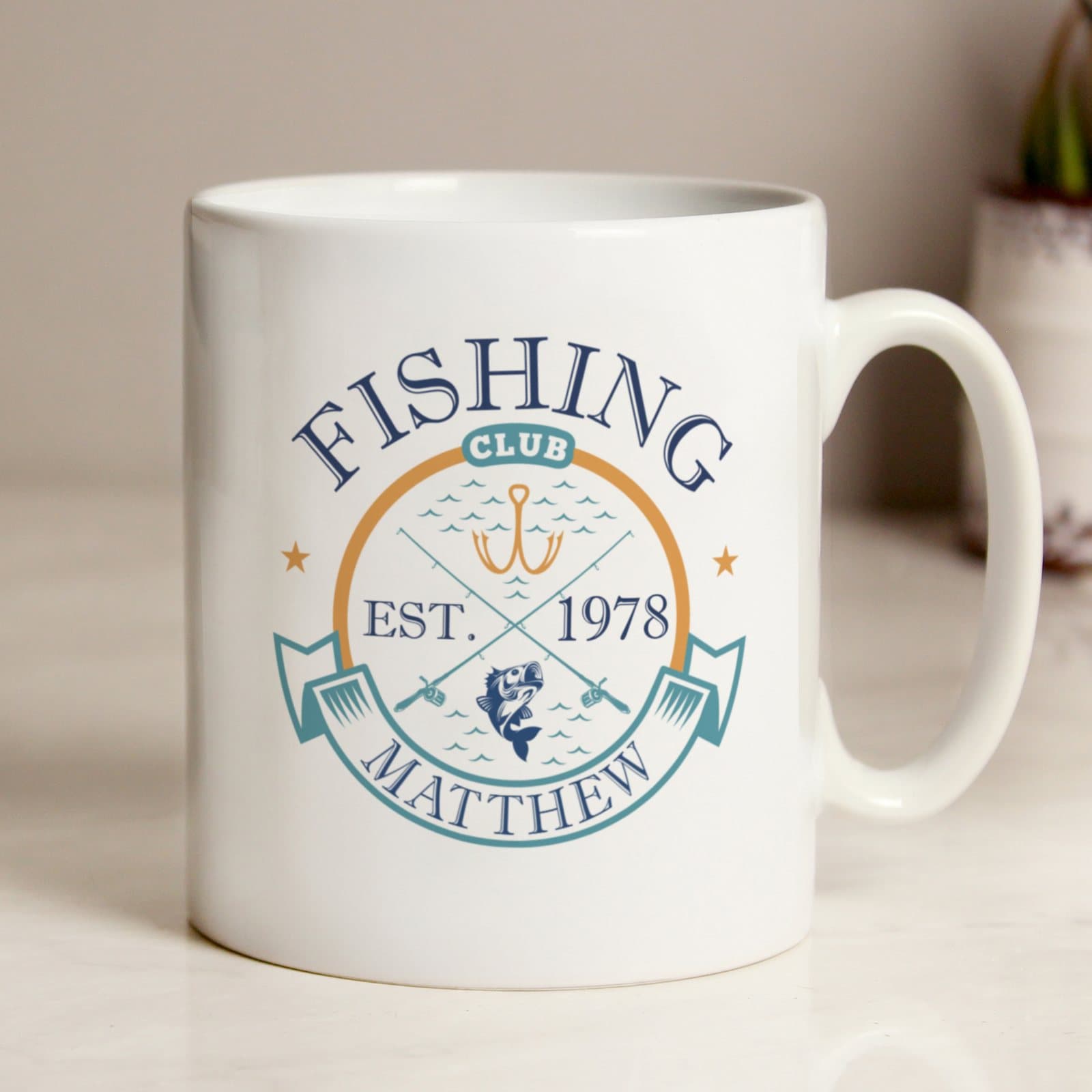 Personalised ceramic mug with a Fishing Club EST. design, a name and a year