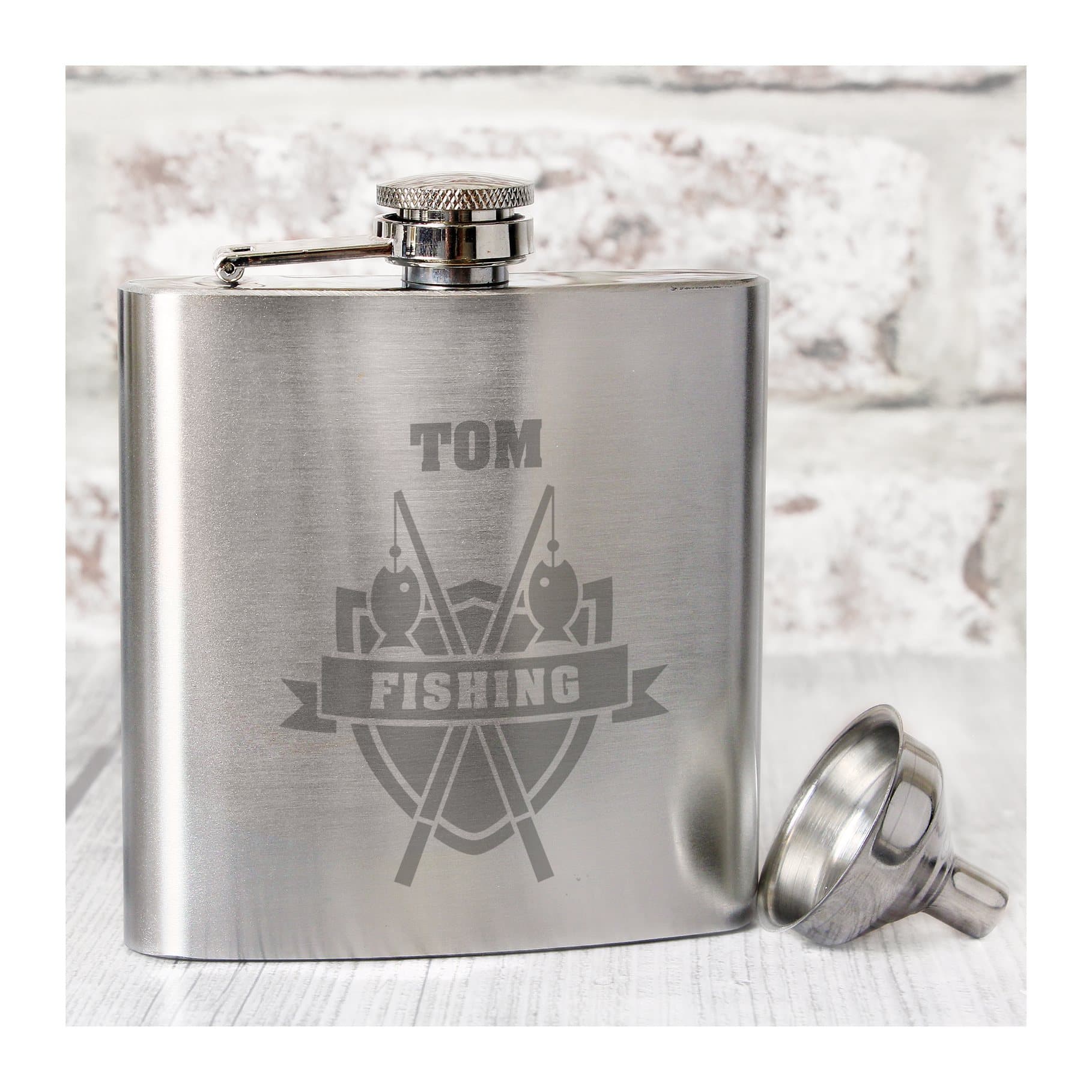 Stainless steel fishing crest hip flask with a personalised name at the top