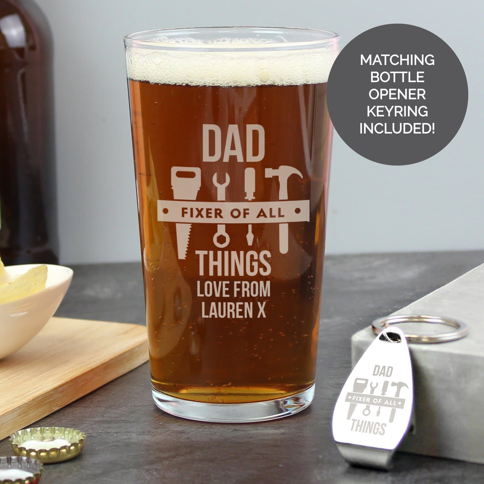 Pint glass with a tool design and a matching metal bottle opener keyring