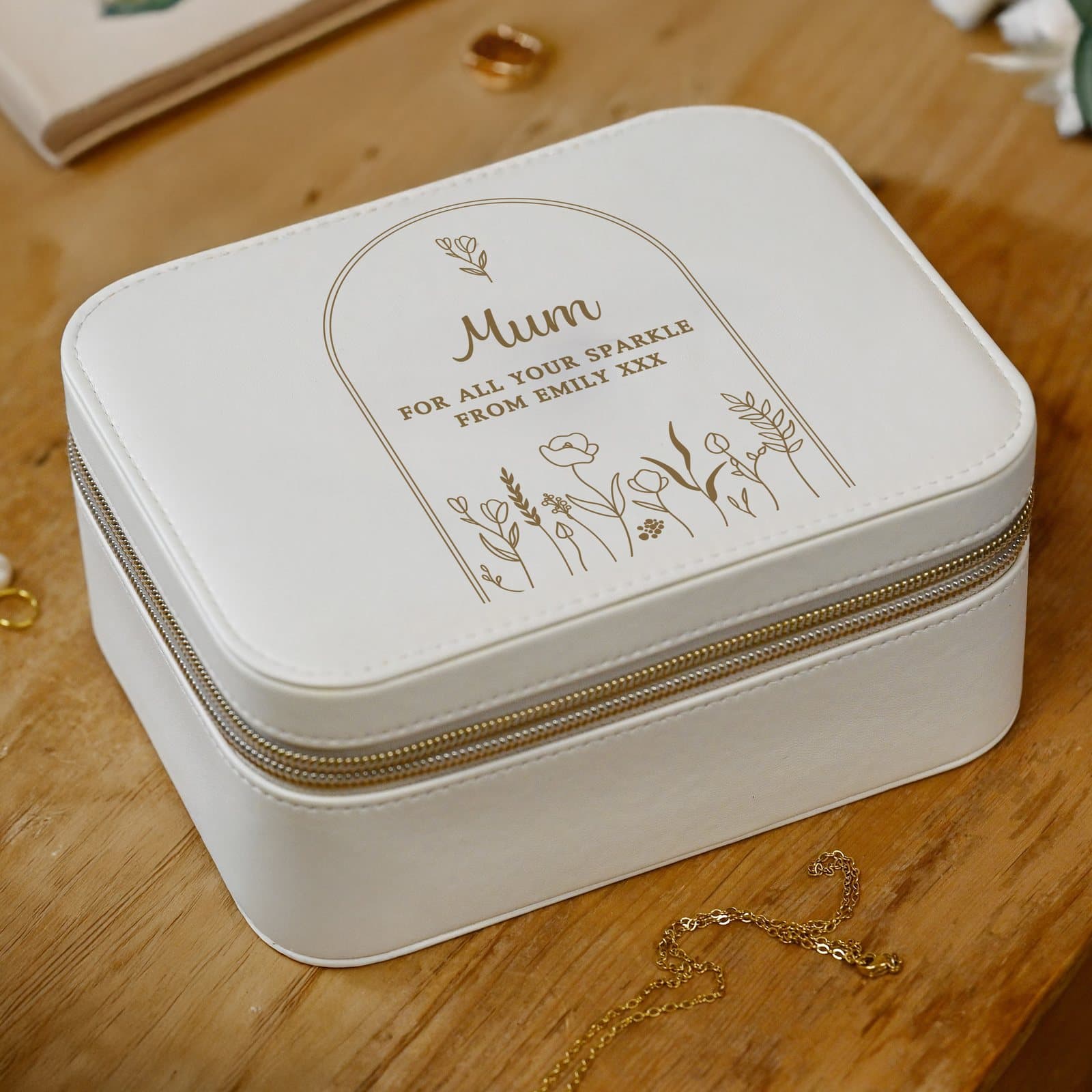 Leatherette jewellery box with a gold floral design and personalised lines