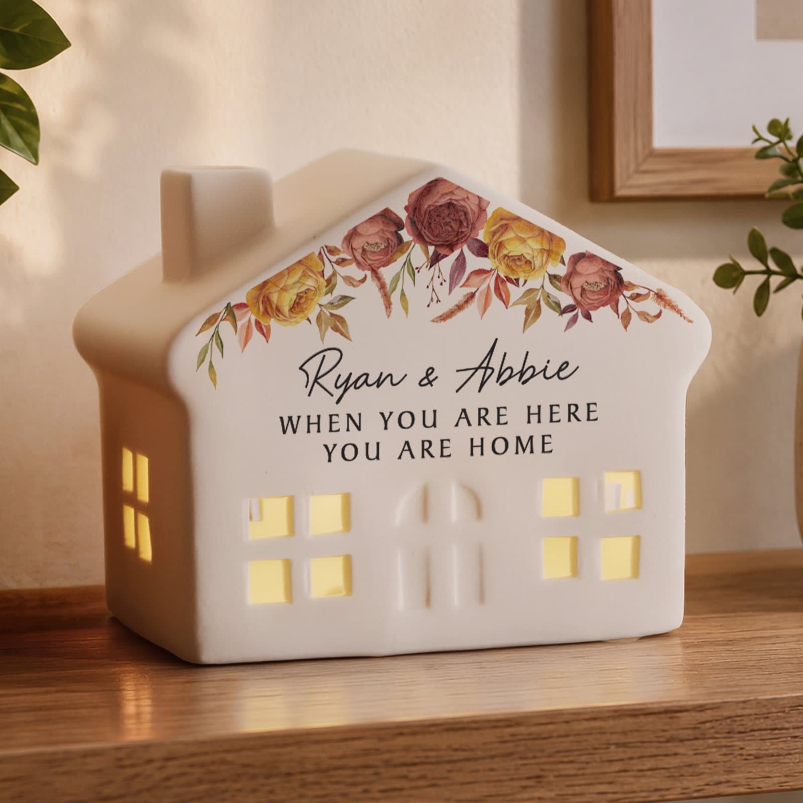 Floral autumn-inspired LED house decoration with personalised text