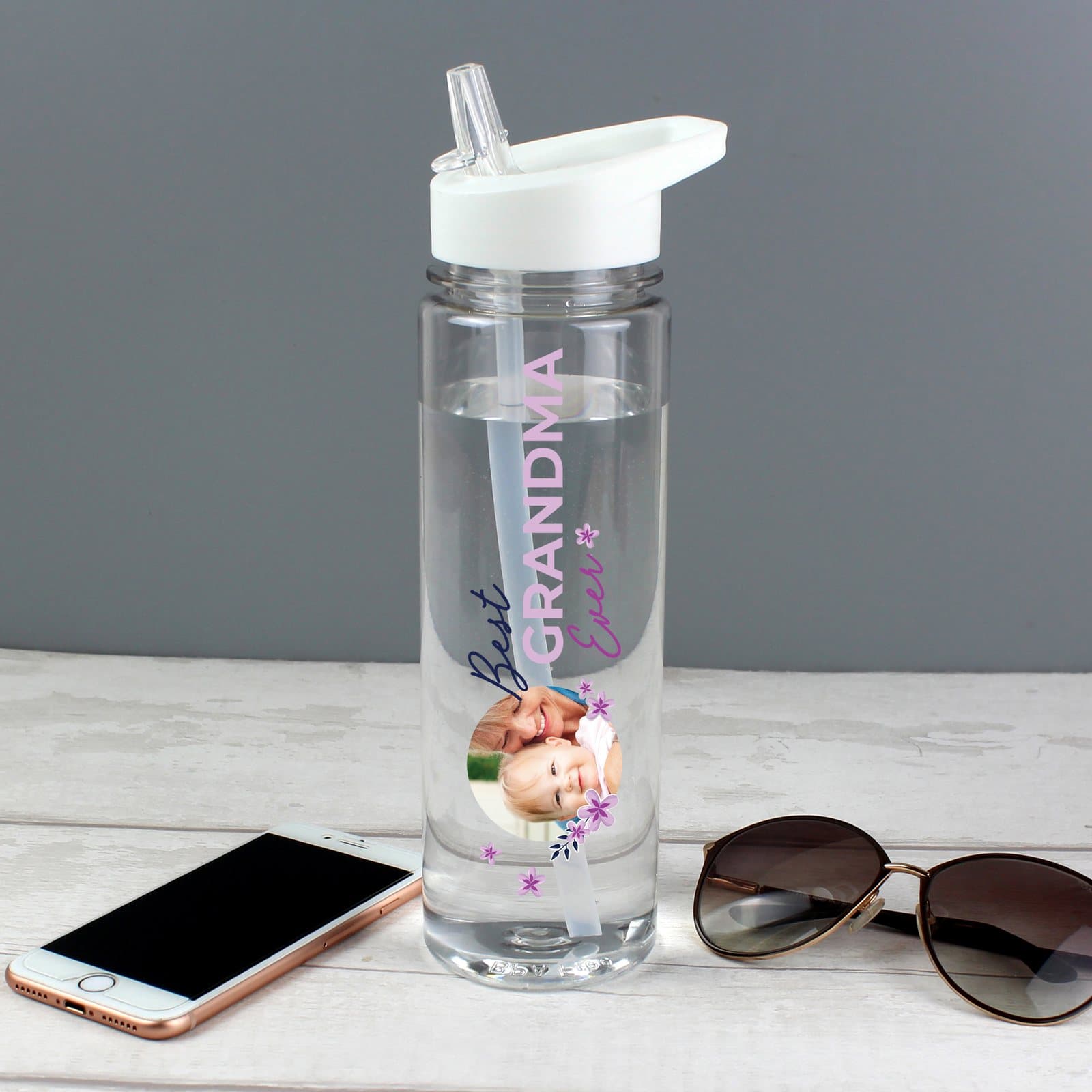 Floral water bottle with a white lid, a photo and a Best Ever title