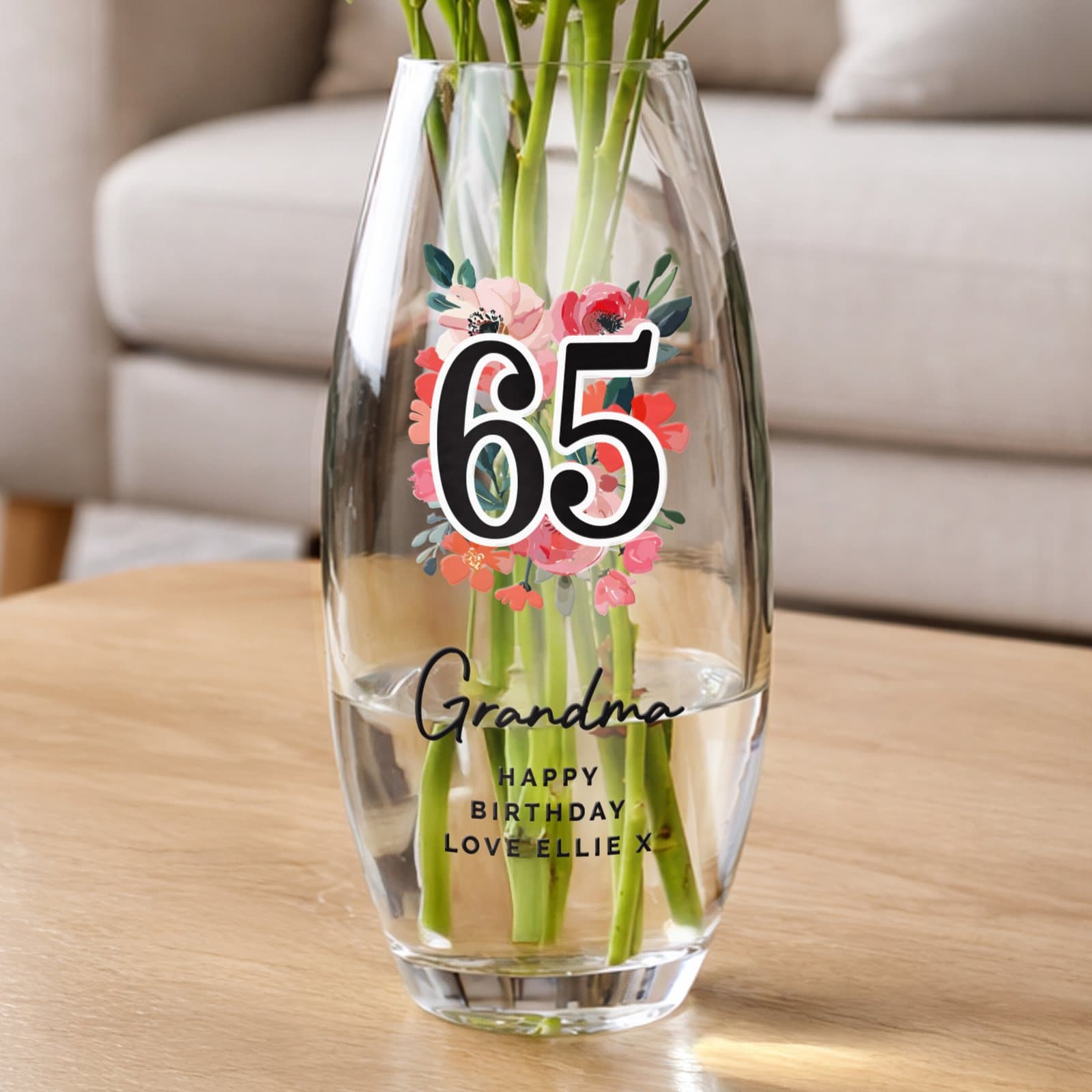 Glass floral bullet vase with a big age and text