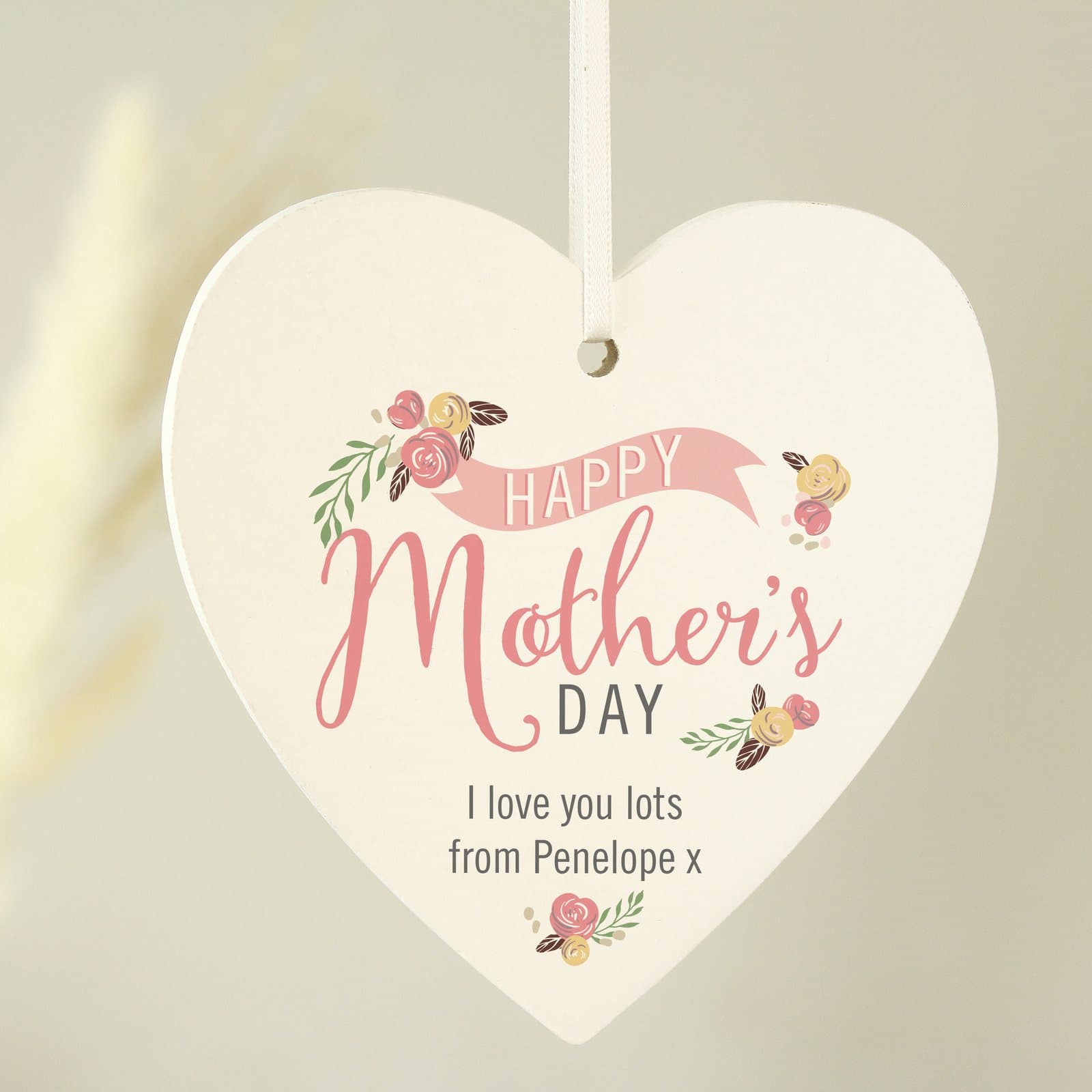 Wooden heart decoration with floral bouquet and Mother's Day wording
