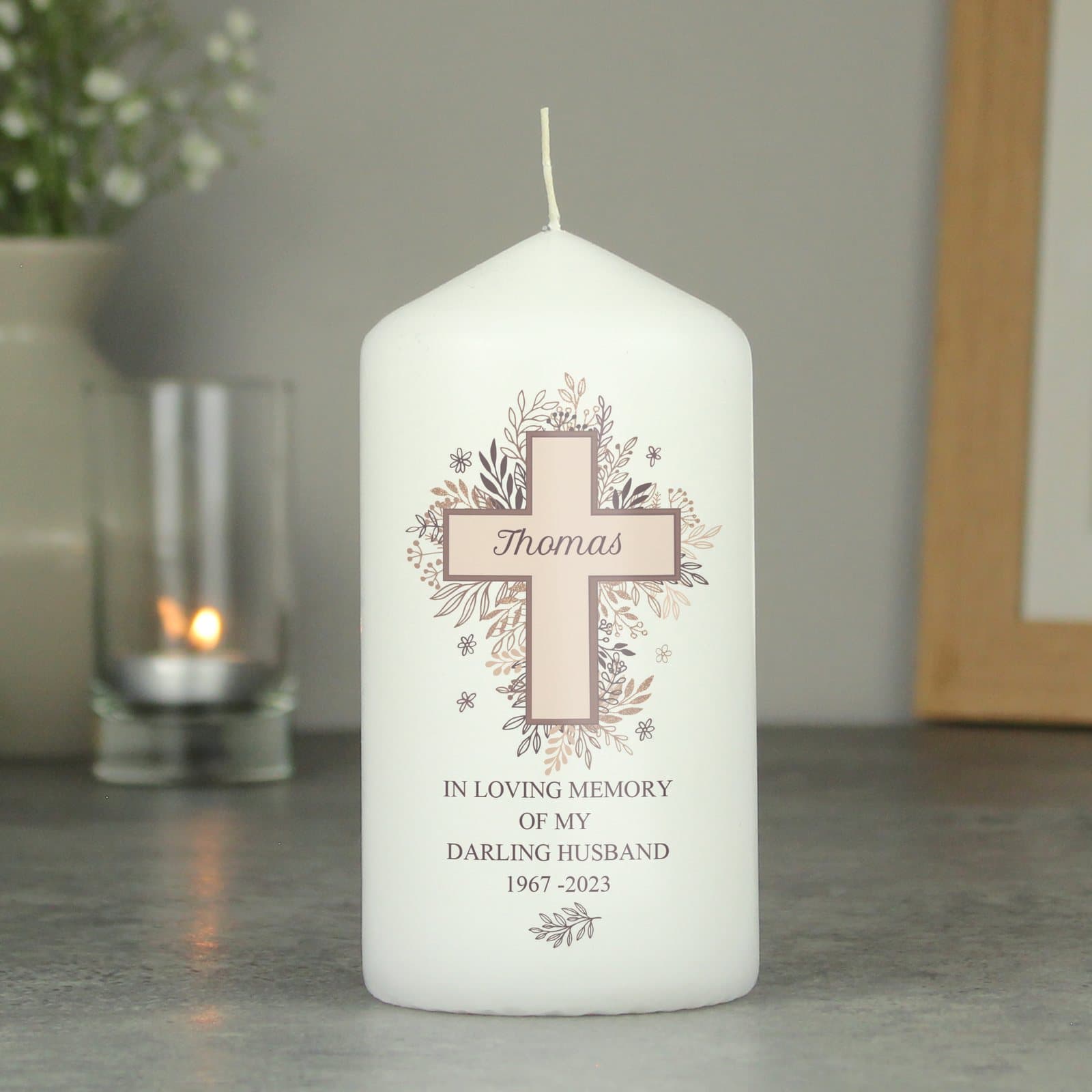 Floral cross pillar candle personalised with a name and a four-line message