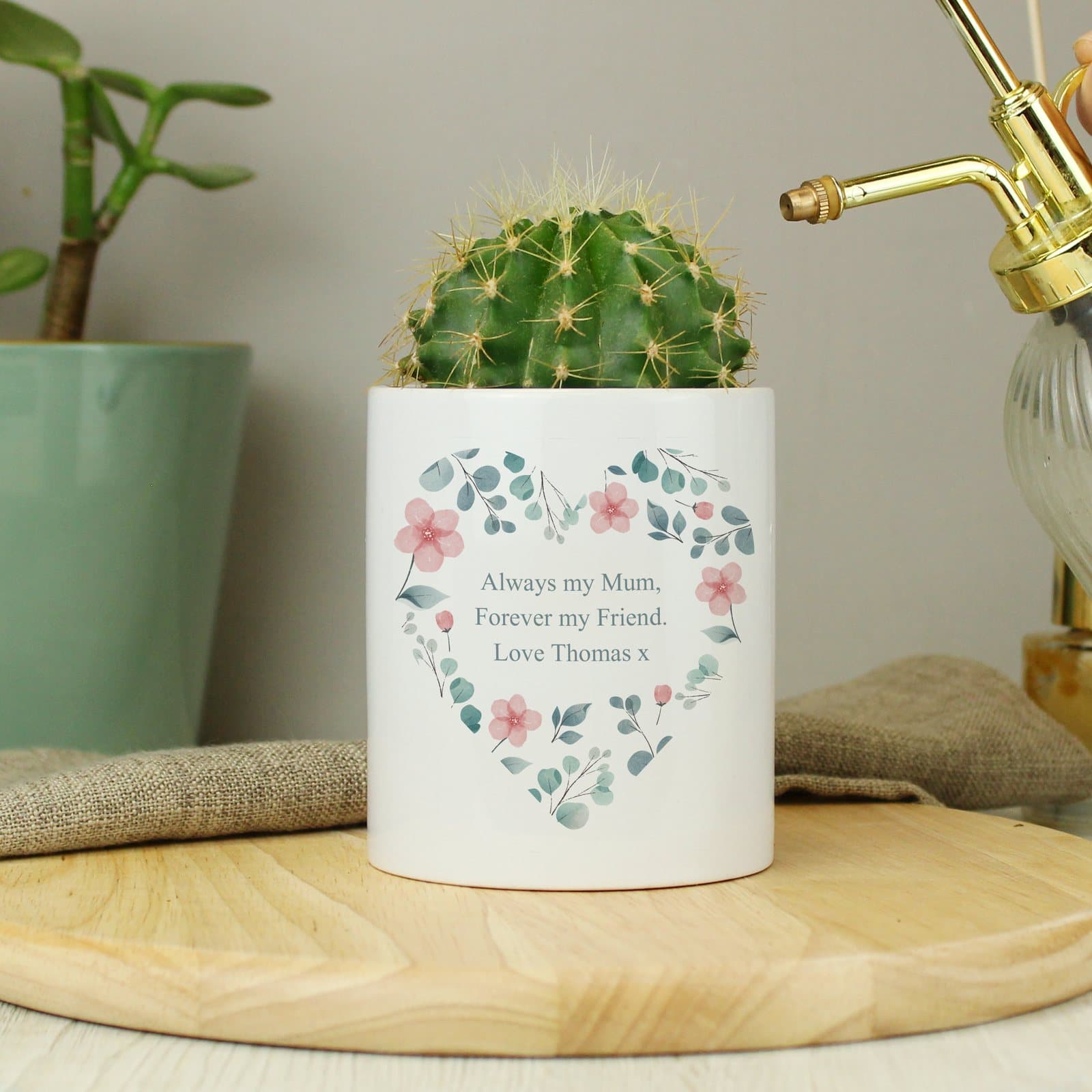 Ceramic storage pot with a floral heart design and personalised text