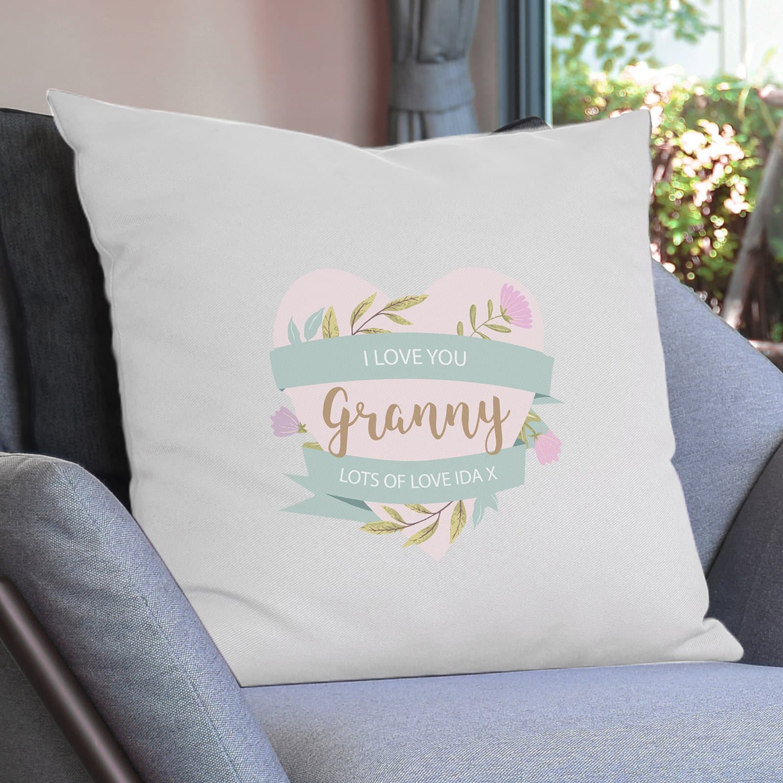 Cream floral heart cushion personalised with three lines of text