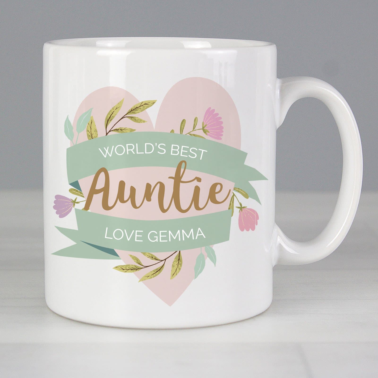 Floral ceramic mug with a heart design and personalised lines of text
