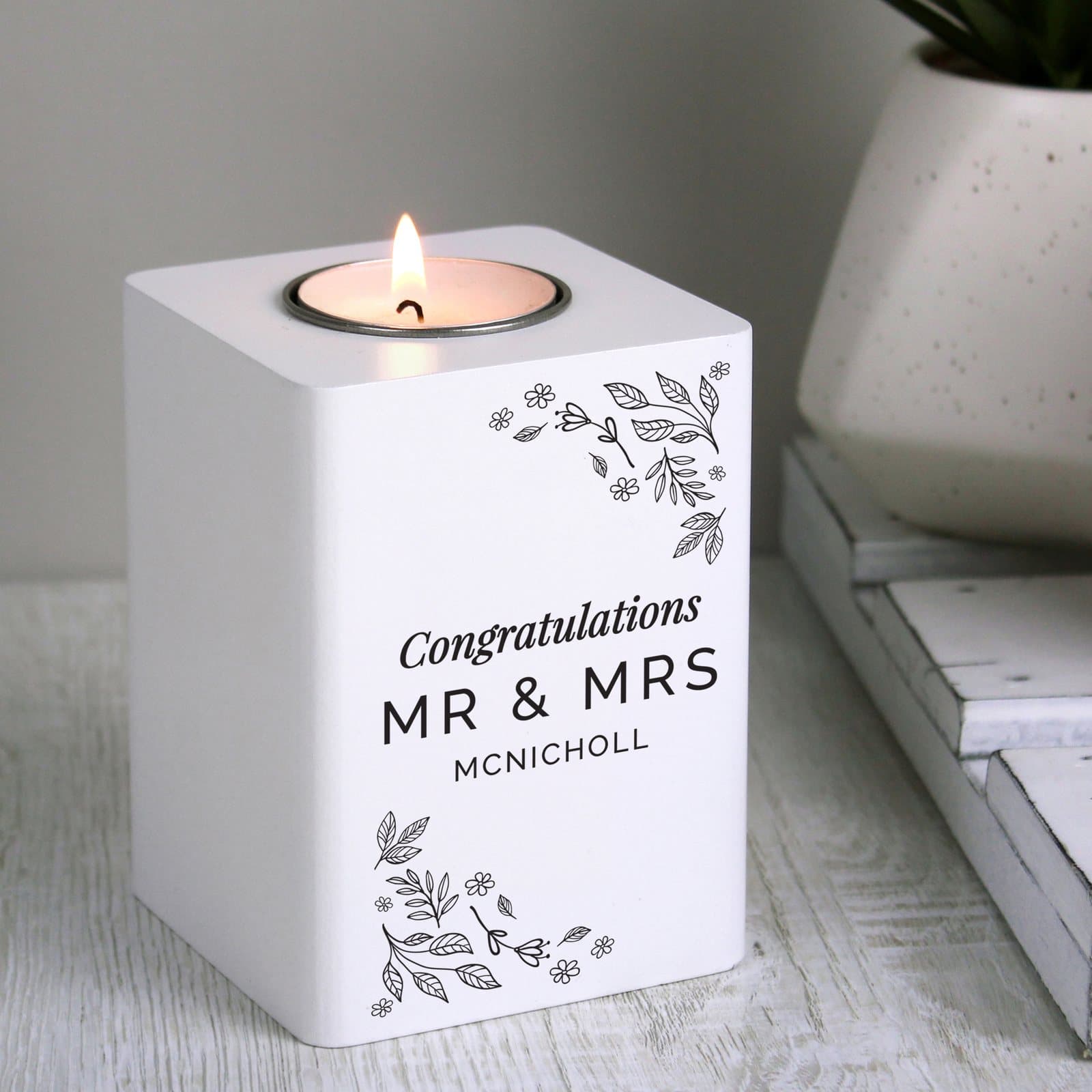 Personalised white wooden tea light holder with floral leaf design and script text
