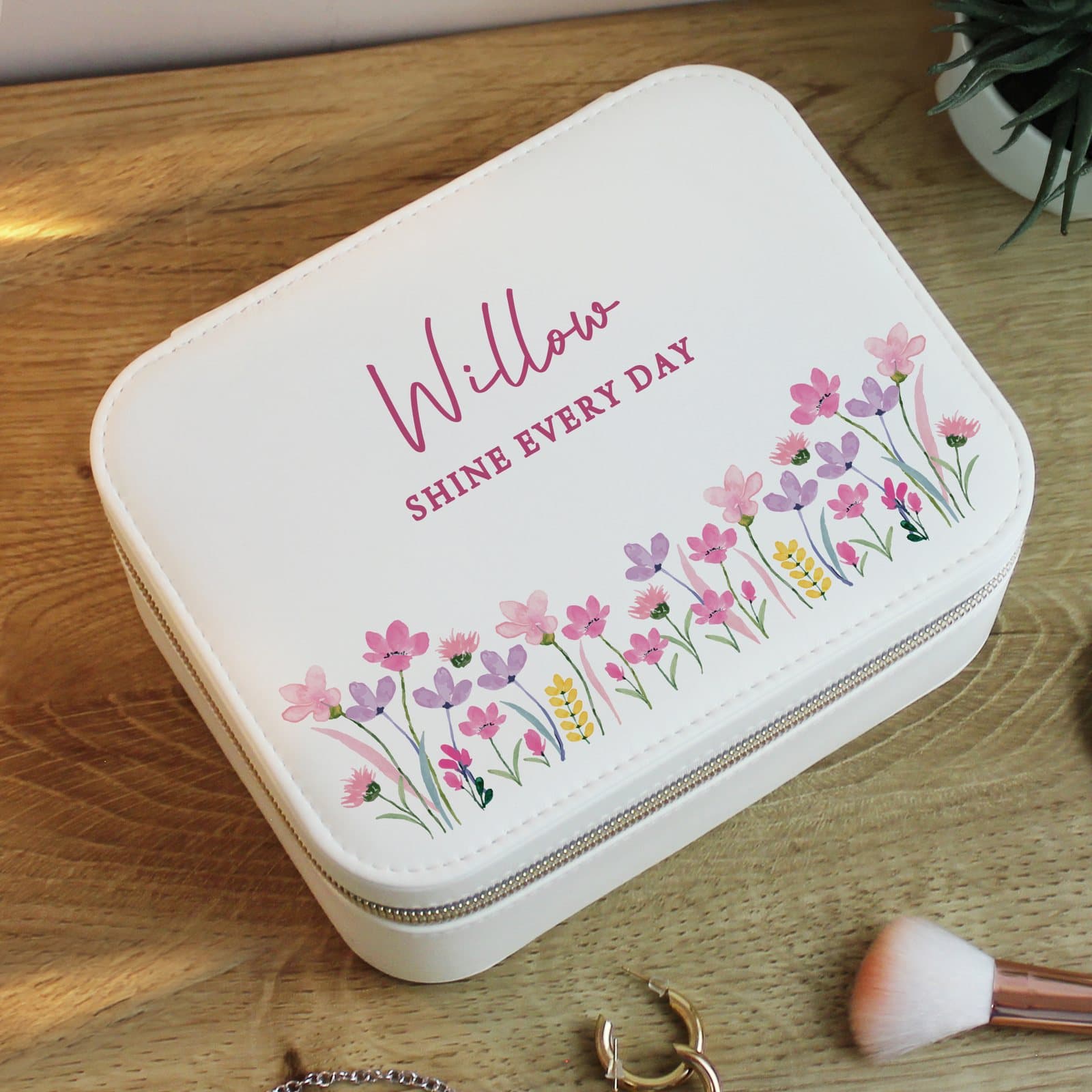 Faux leather jewellery box with a pastel floral design