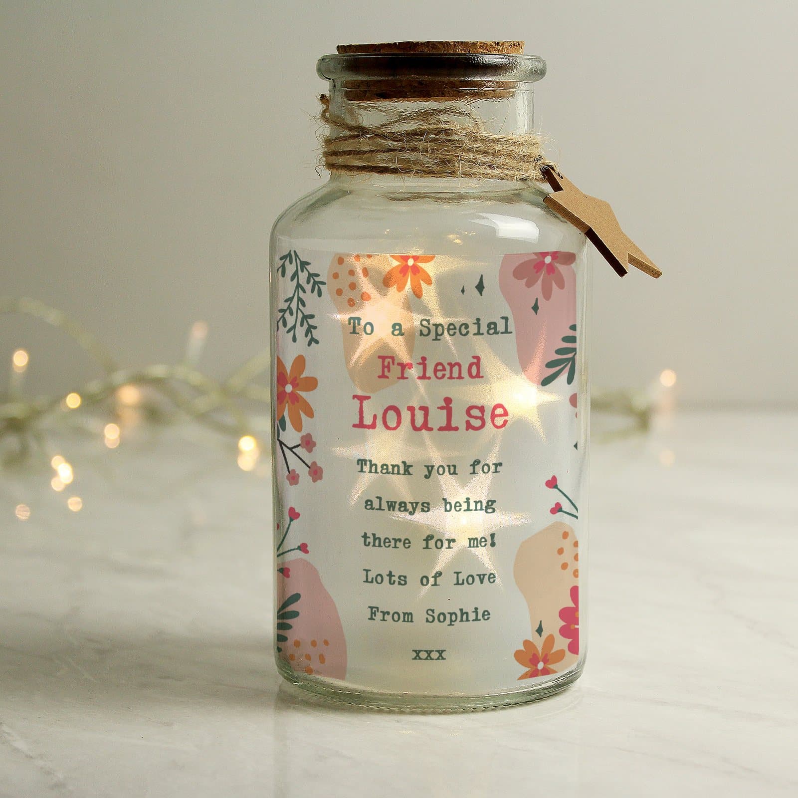 Glass LED jar with a floral design and personalised lines of text