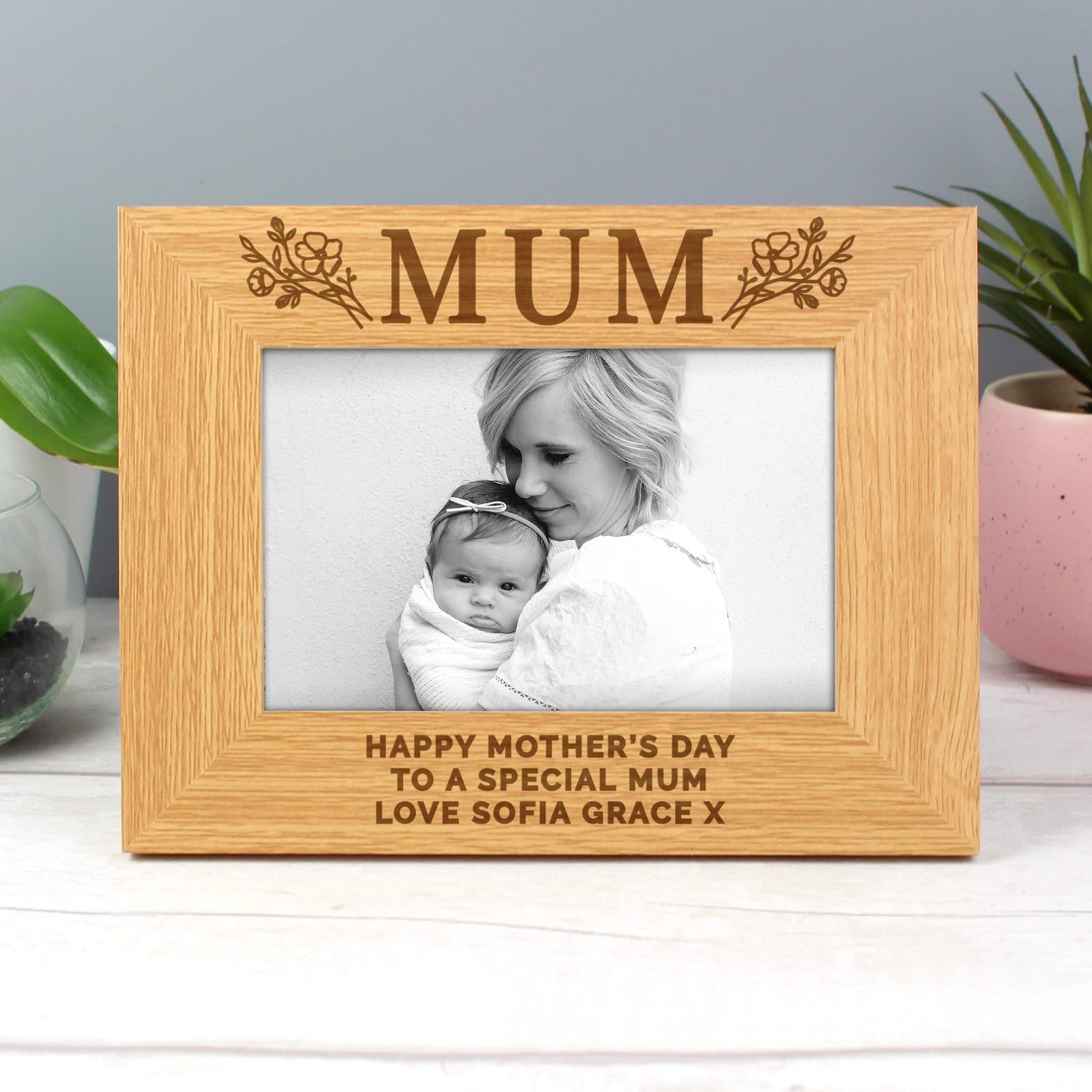 Wooden photo frame with a floral design, the word Mum and personalised lines below