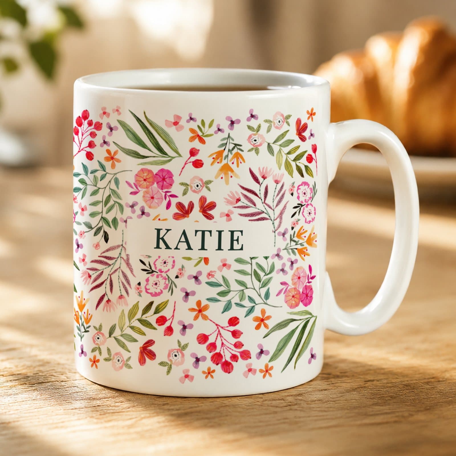 Personalised ceramic mug with a floral pattern design