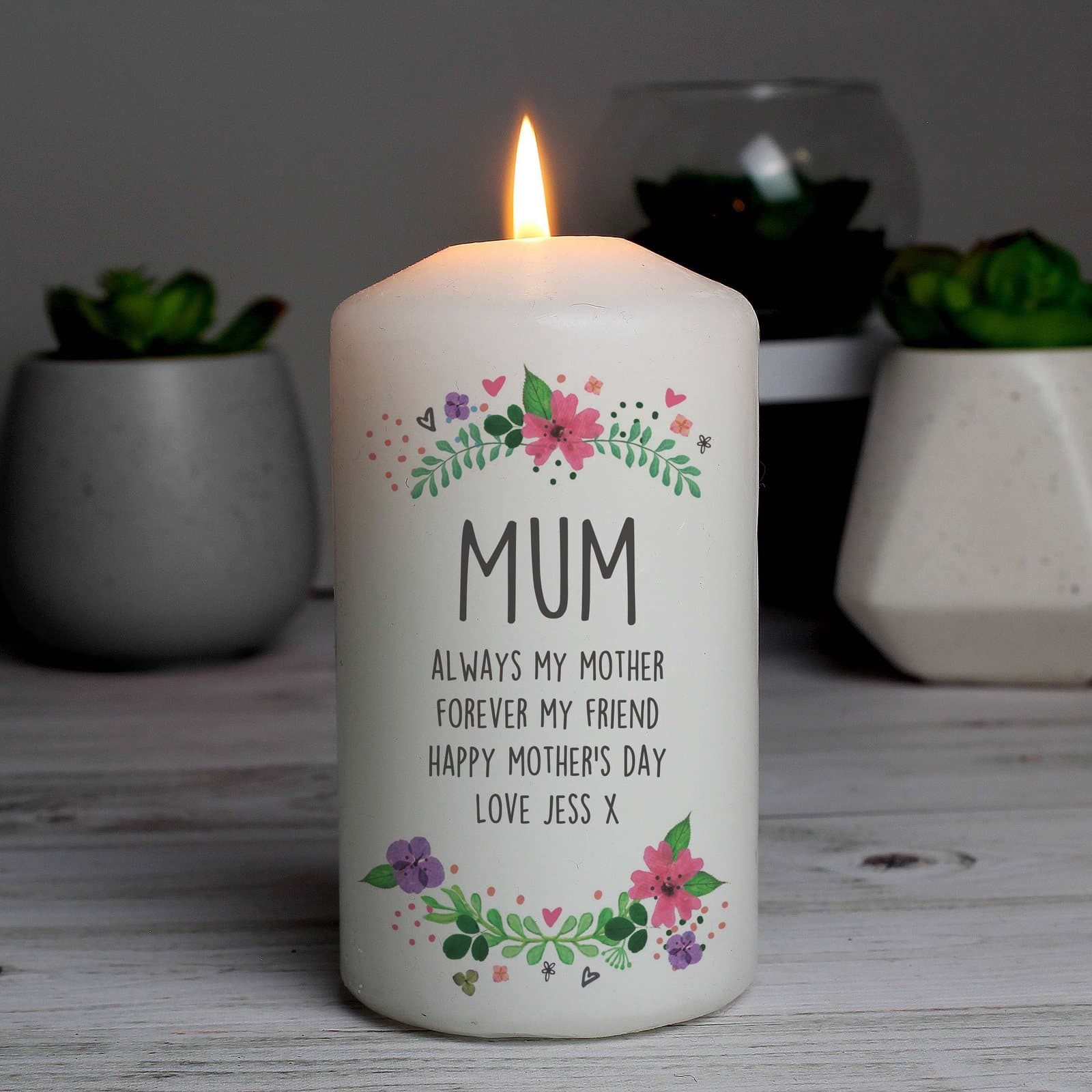 Floral pillar candle personalised with a larger first line and message