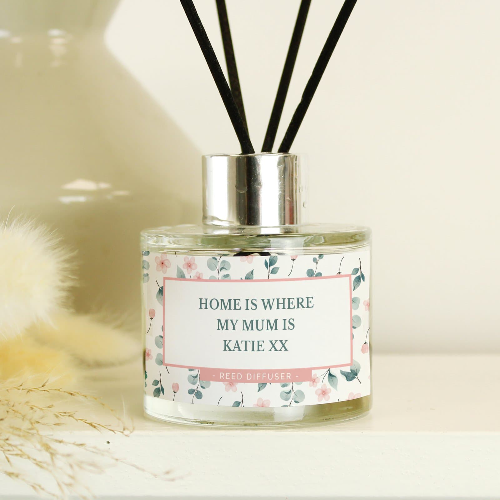 Personalised floral reed diffuser in glass with three lines of text