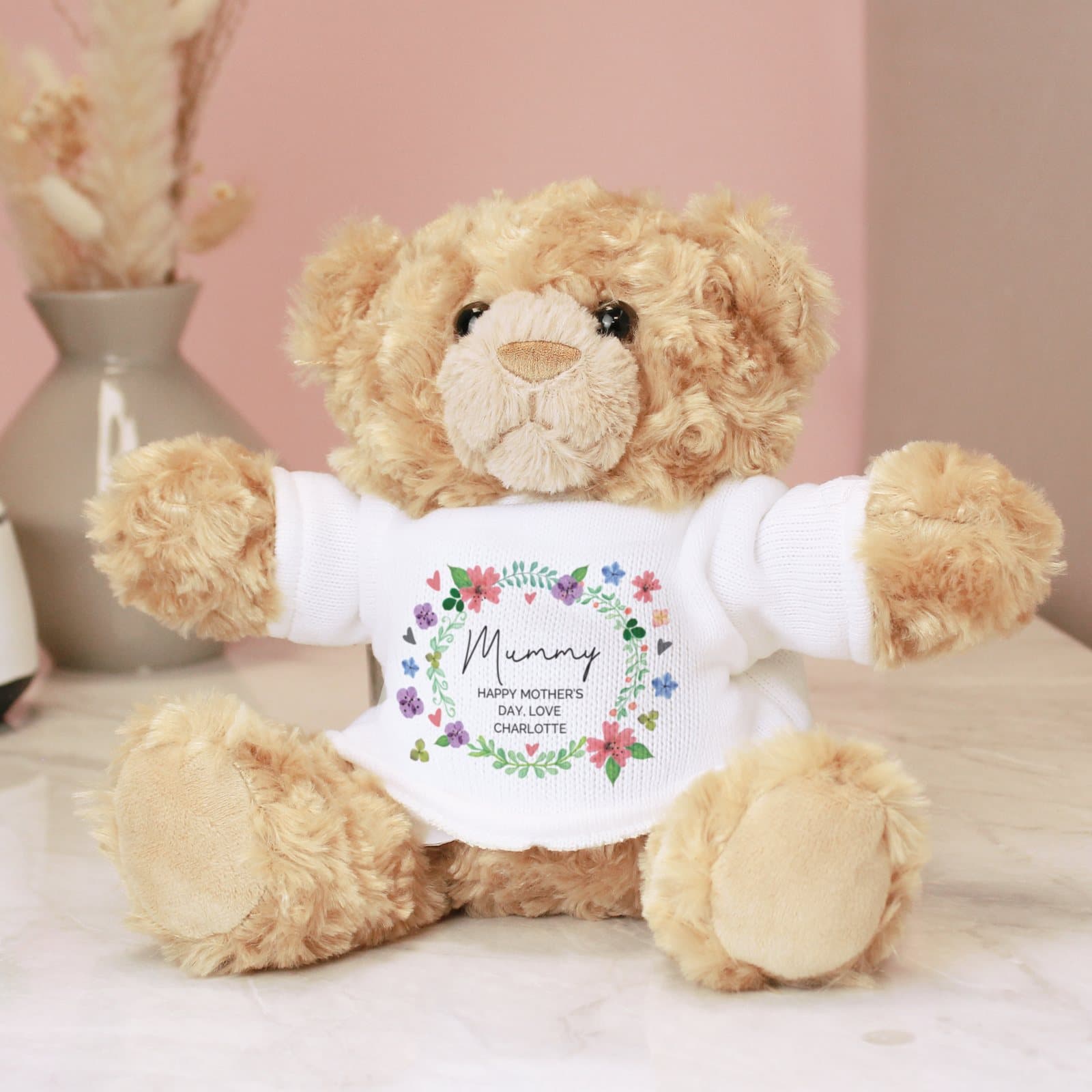 Floral teddy bear wearing a t-shirt, ready for a name and message
