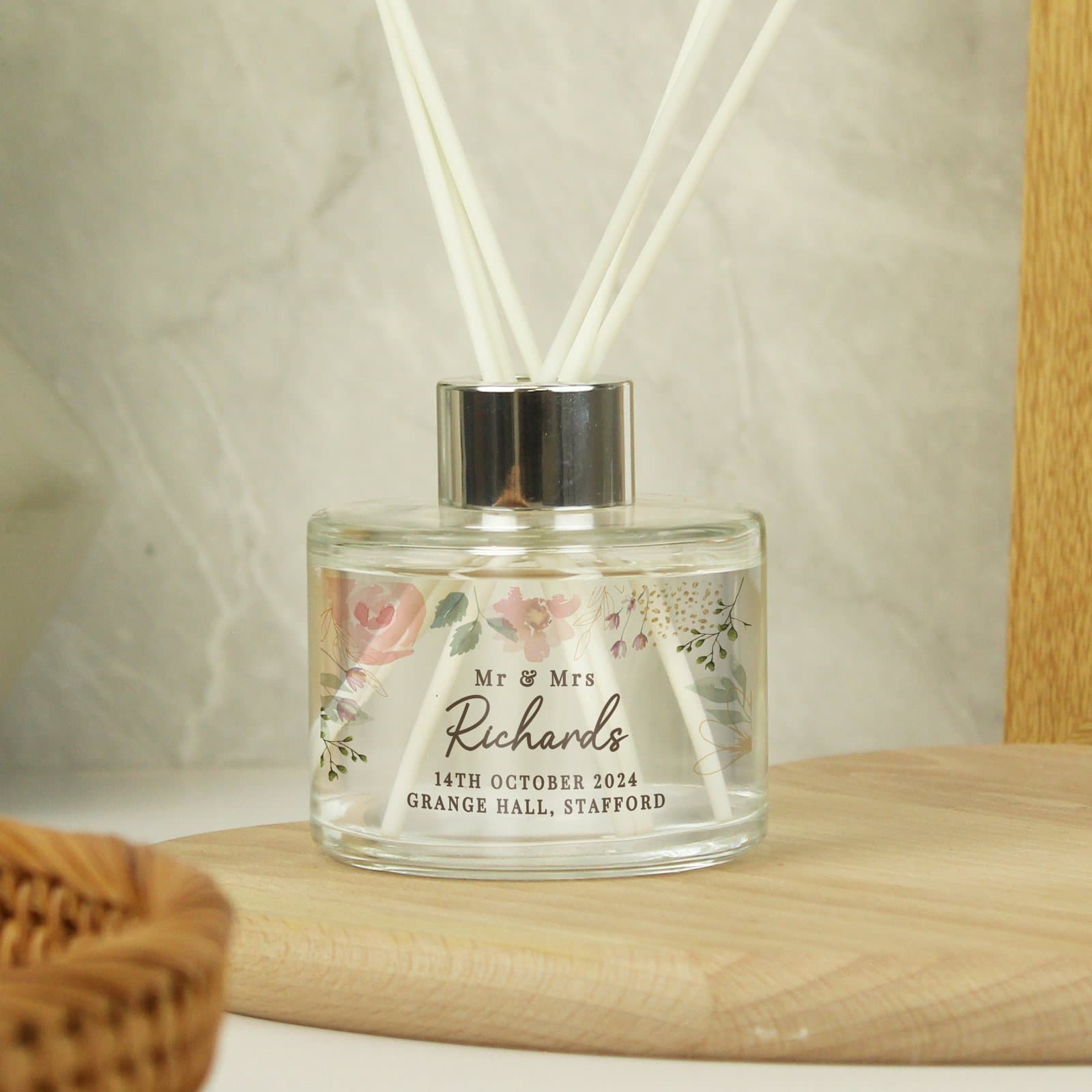 Personalised floral watercolour reed diffuser in glass with four lines of text