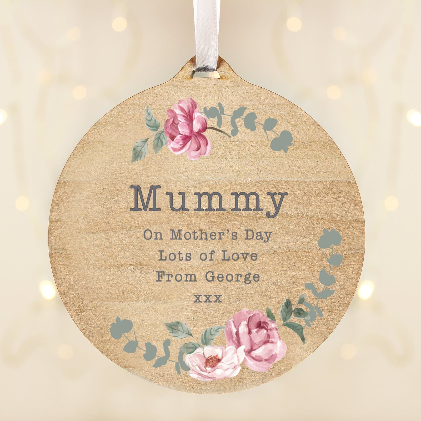 Round wooden floral watercolour decoration personalised with five lines and a ribbon