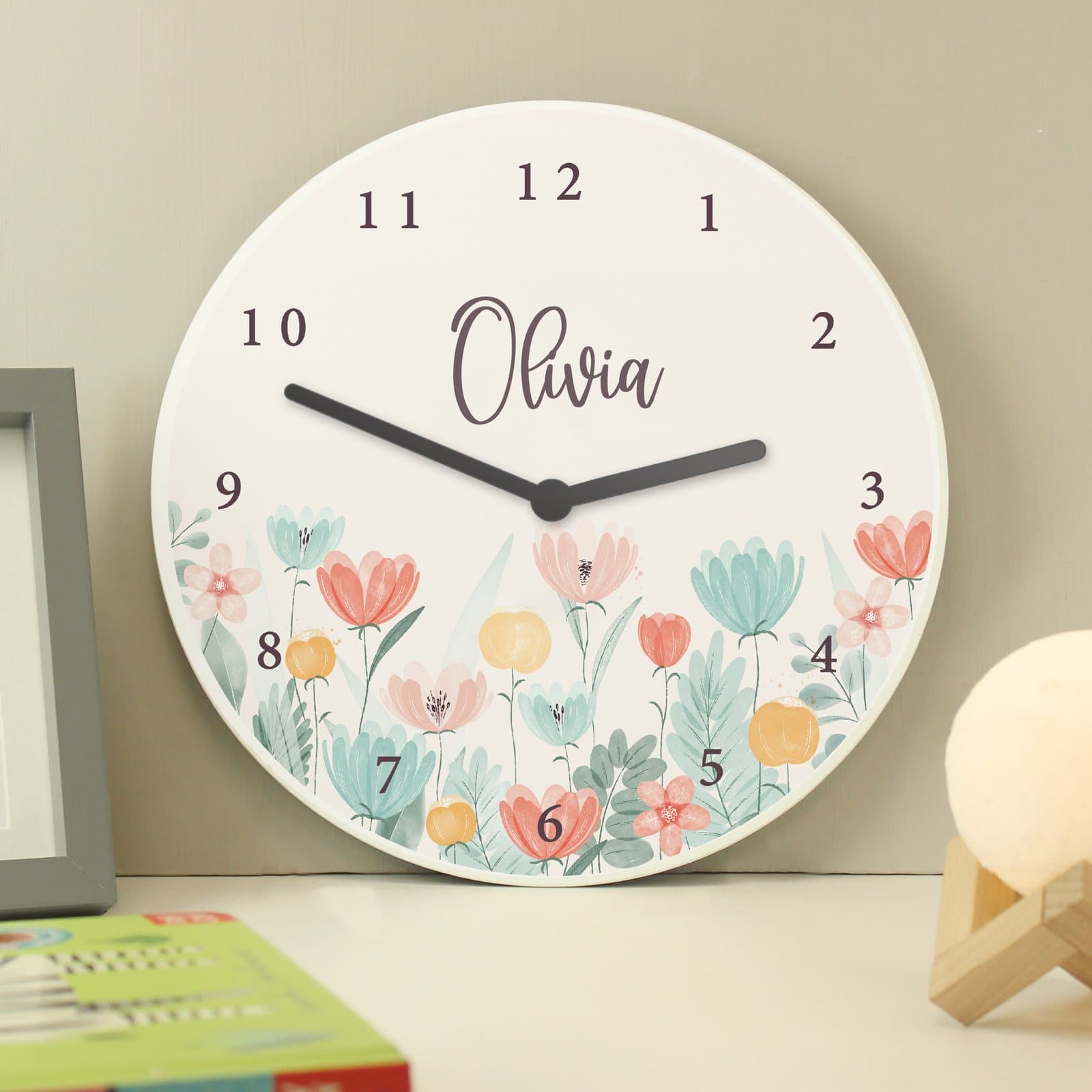 Personalised floral wooden children's clock with a name