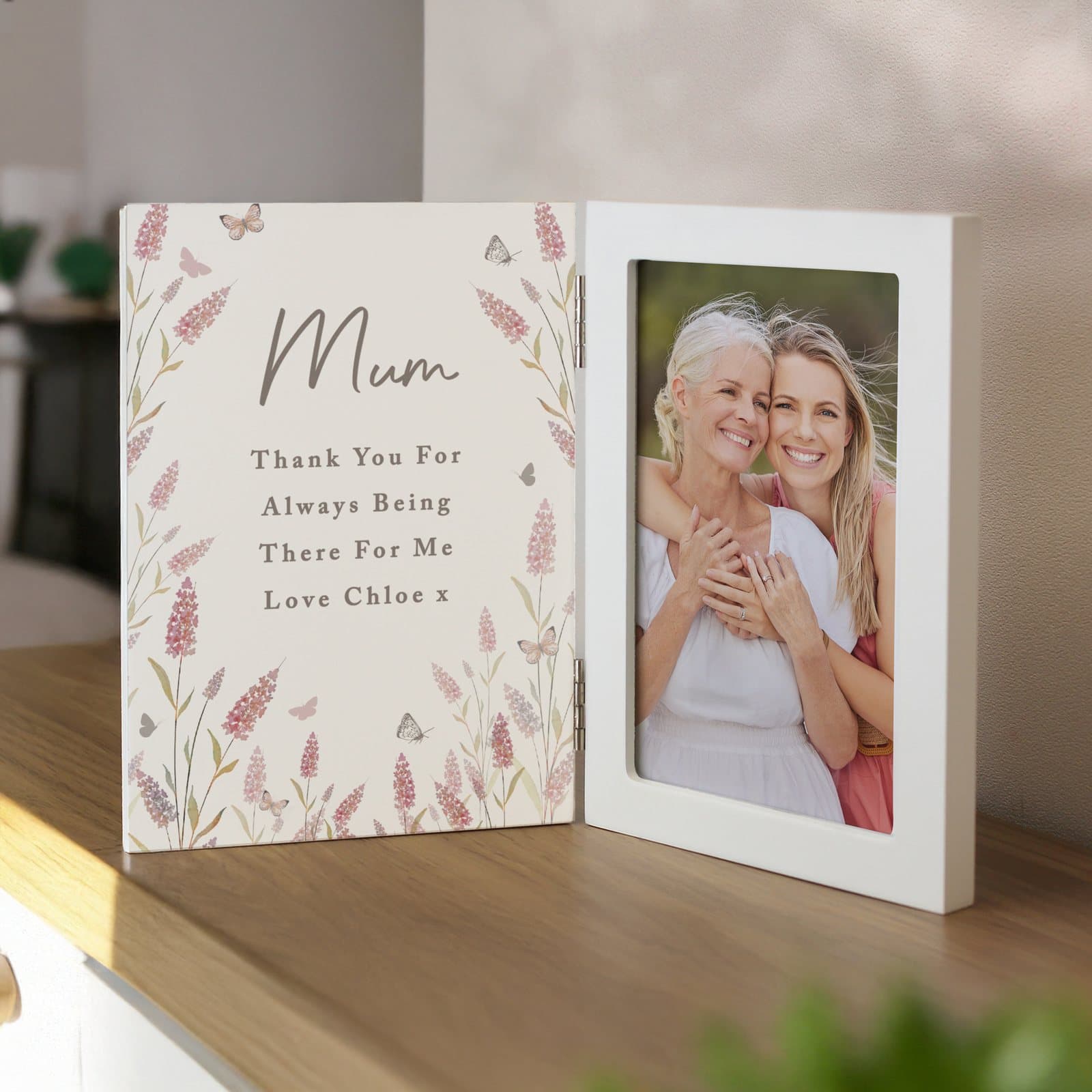 Hinged wooden photo frame with a floral design and personalised lines of text