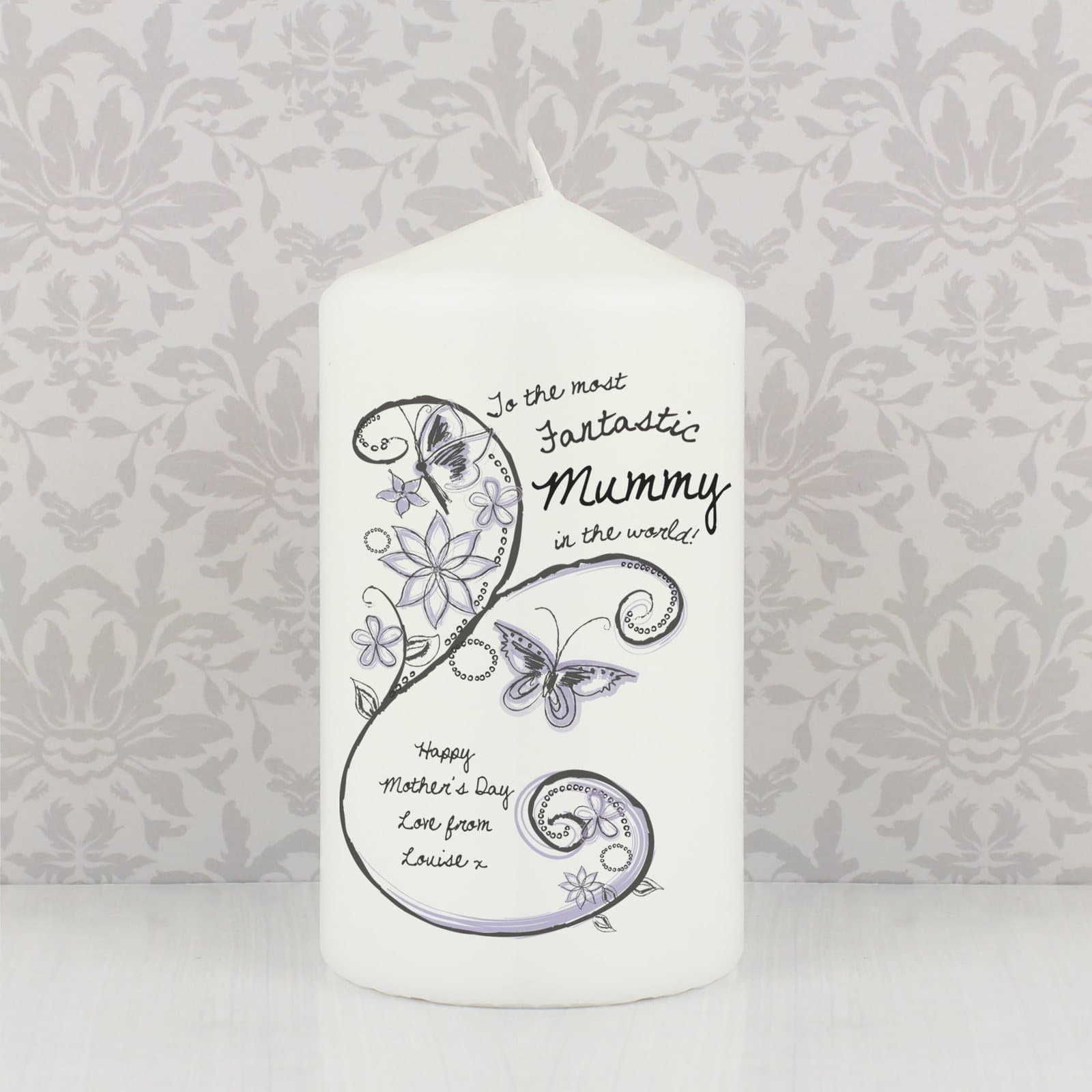 Pillar candle with a flower pattern and personalised name and message