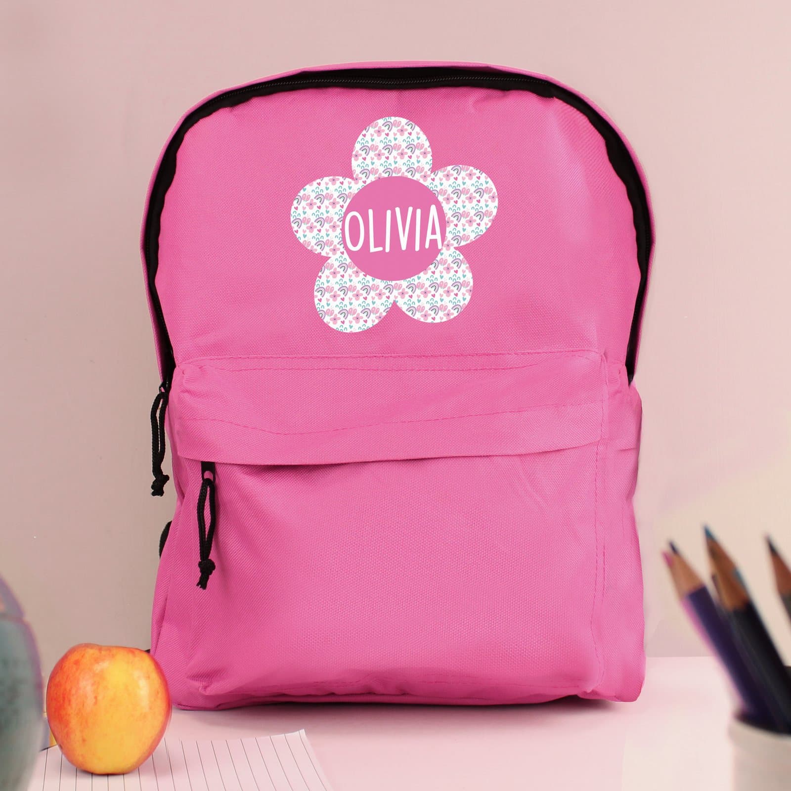 Pink flower backpack for children with adjustable straps and front zip pocket