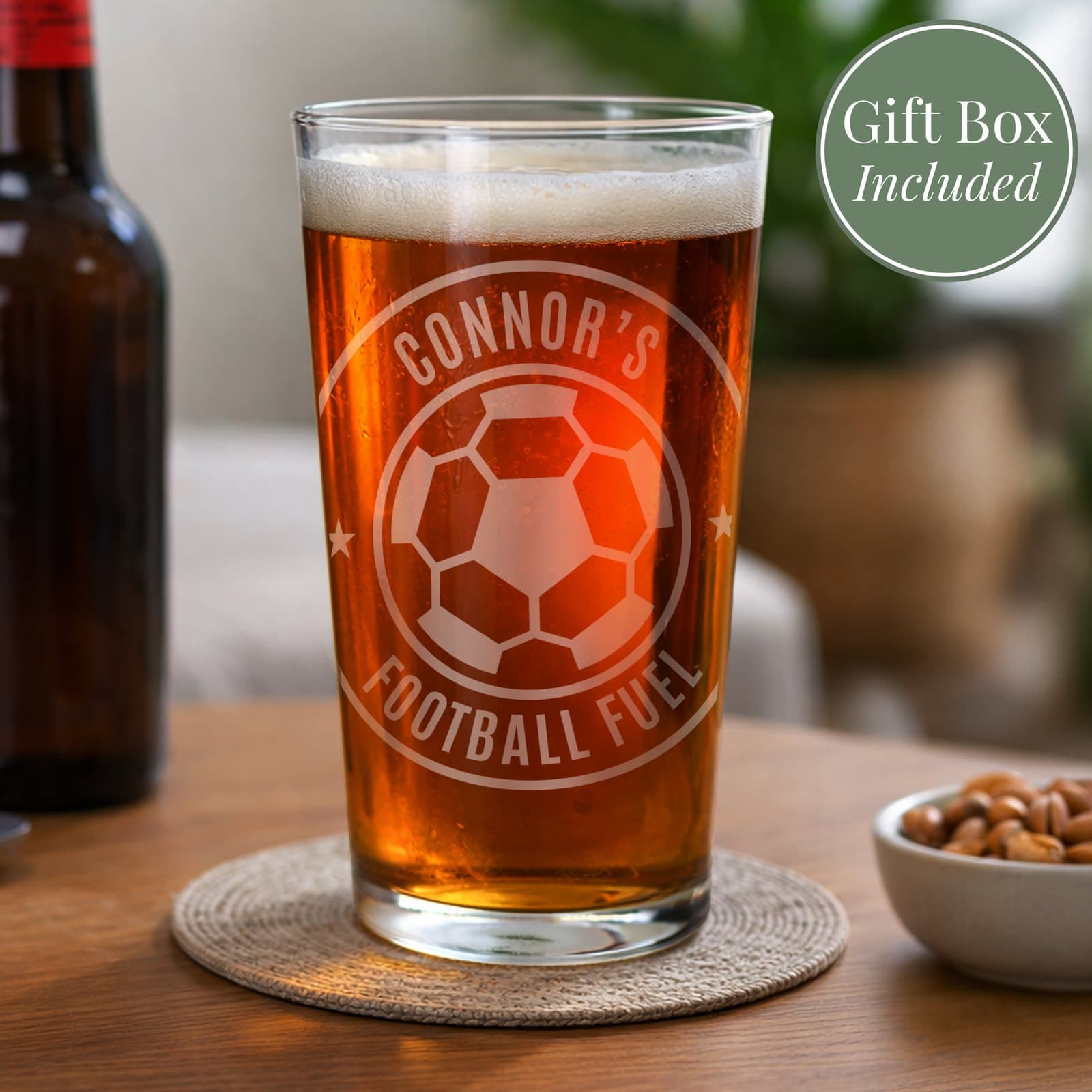 Personalised pint glass with a football badge design and two lines of text