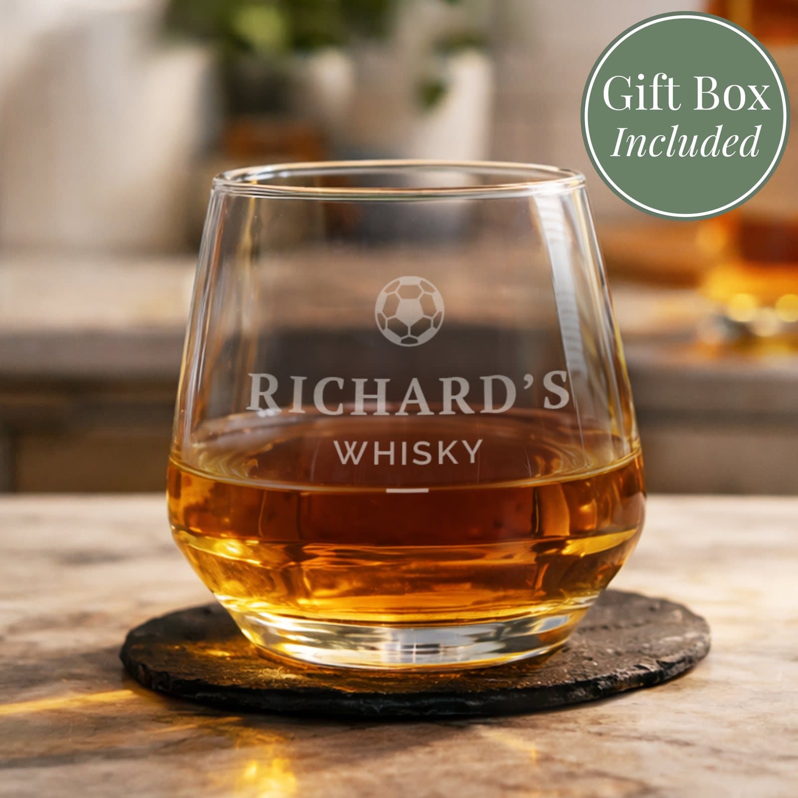 Glass tumbler with a football motif and personalised text