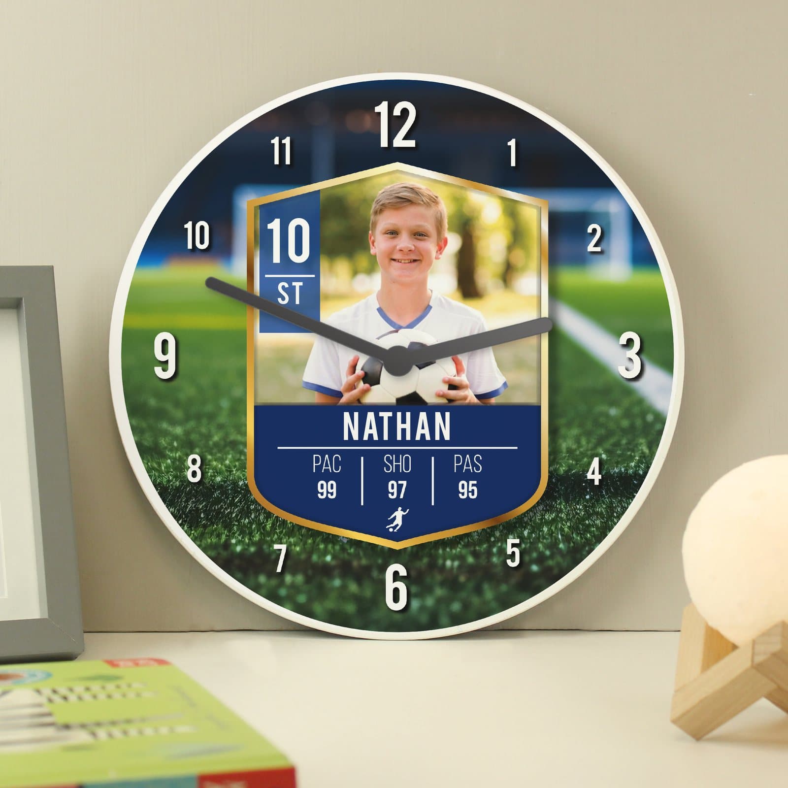 Square wooden wall clock in a football card design with a child's photo, name and number