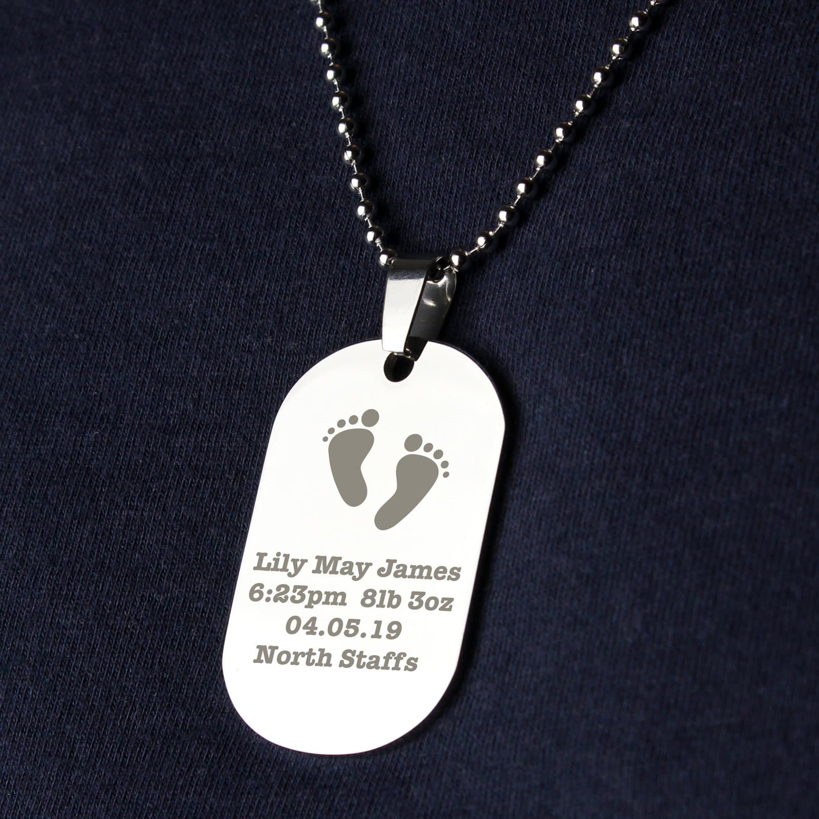 Stainless steel dog tag necklace with a footprints design