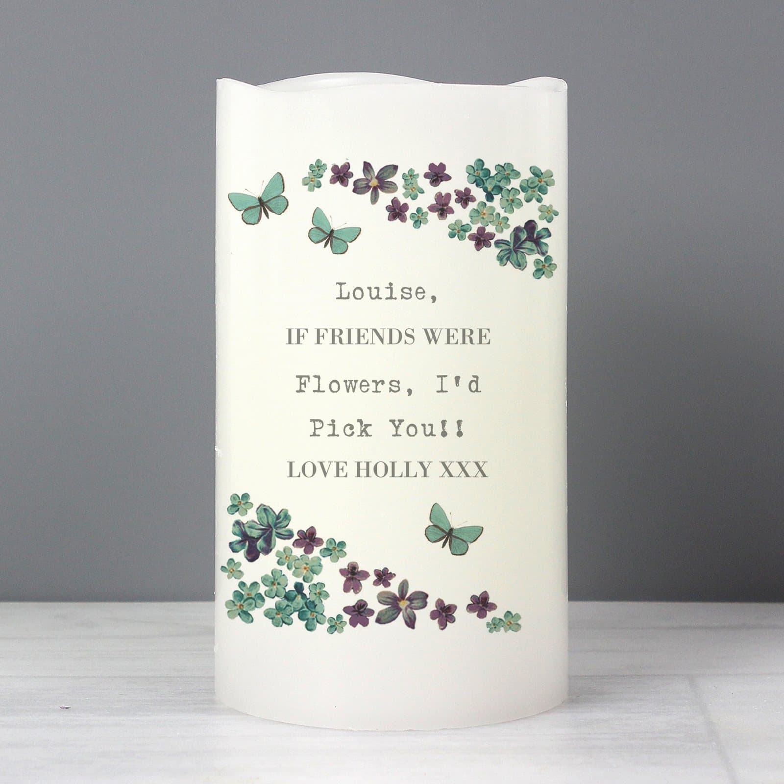 LED candle with a forget me not design and personalised message