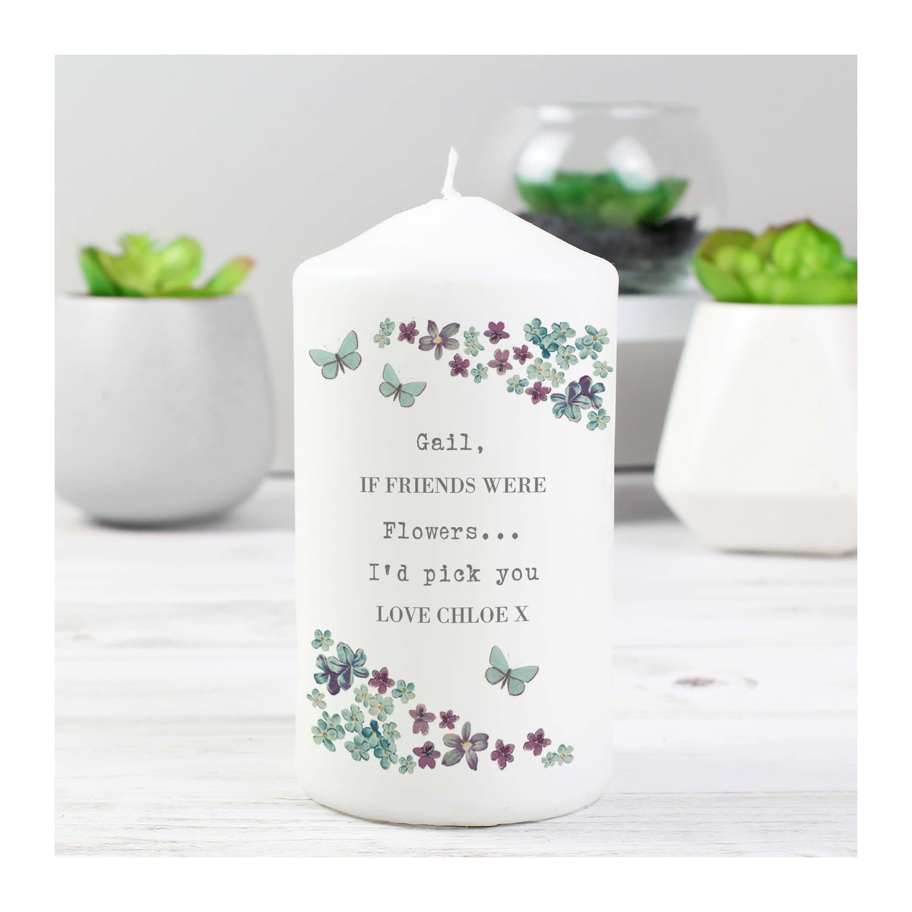 Pillar candle with a forget me not design and a personalised message
